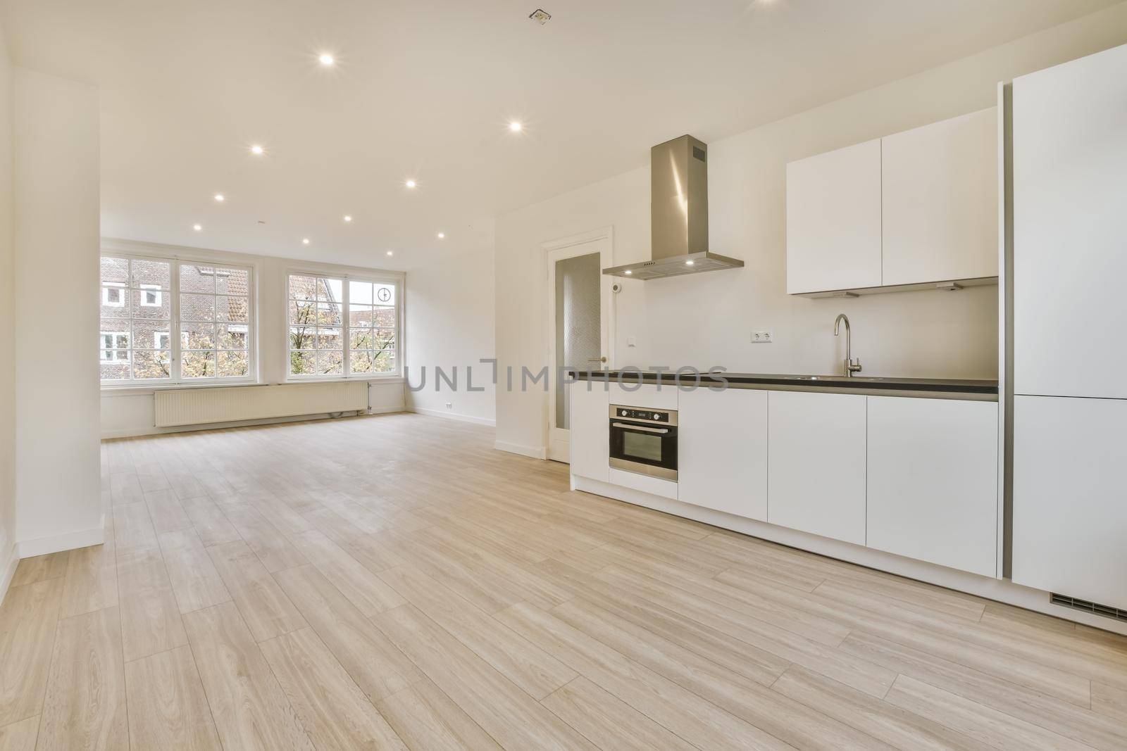 Stylish large kitchen area with large window