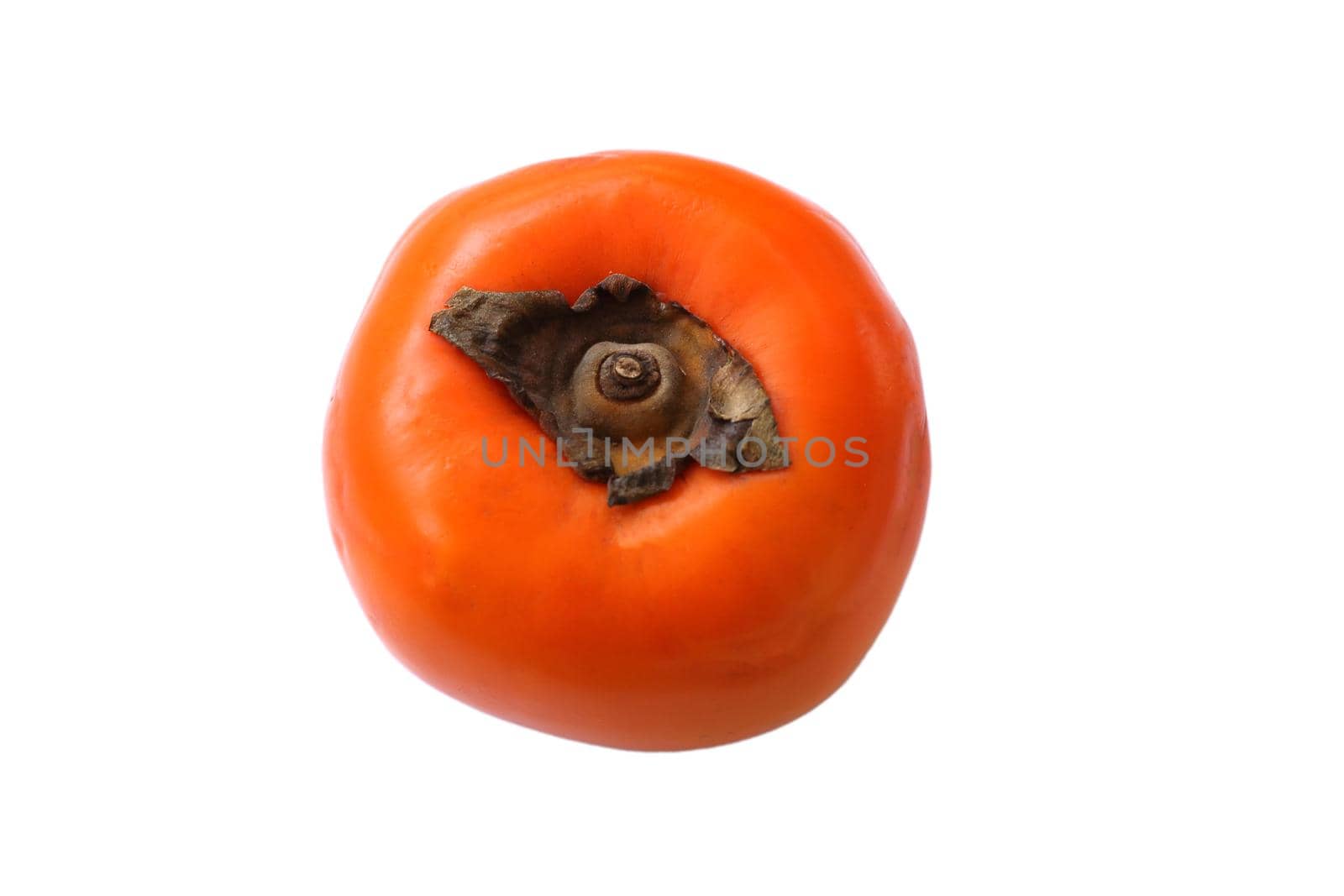 Ripe persimmon isolated on a white background. The polarity of the fruit is brown.