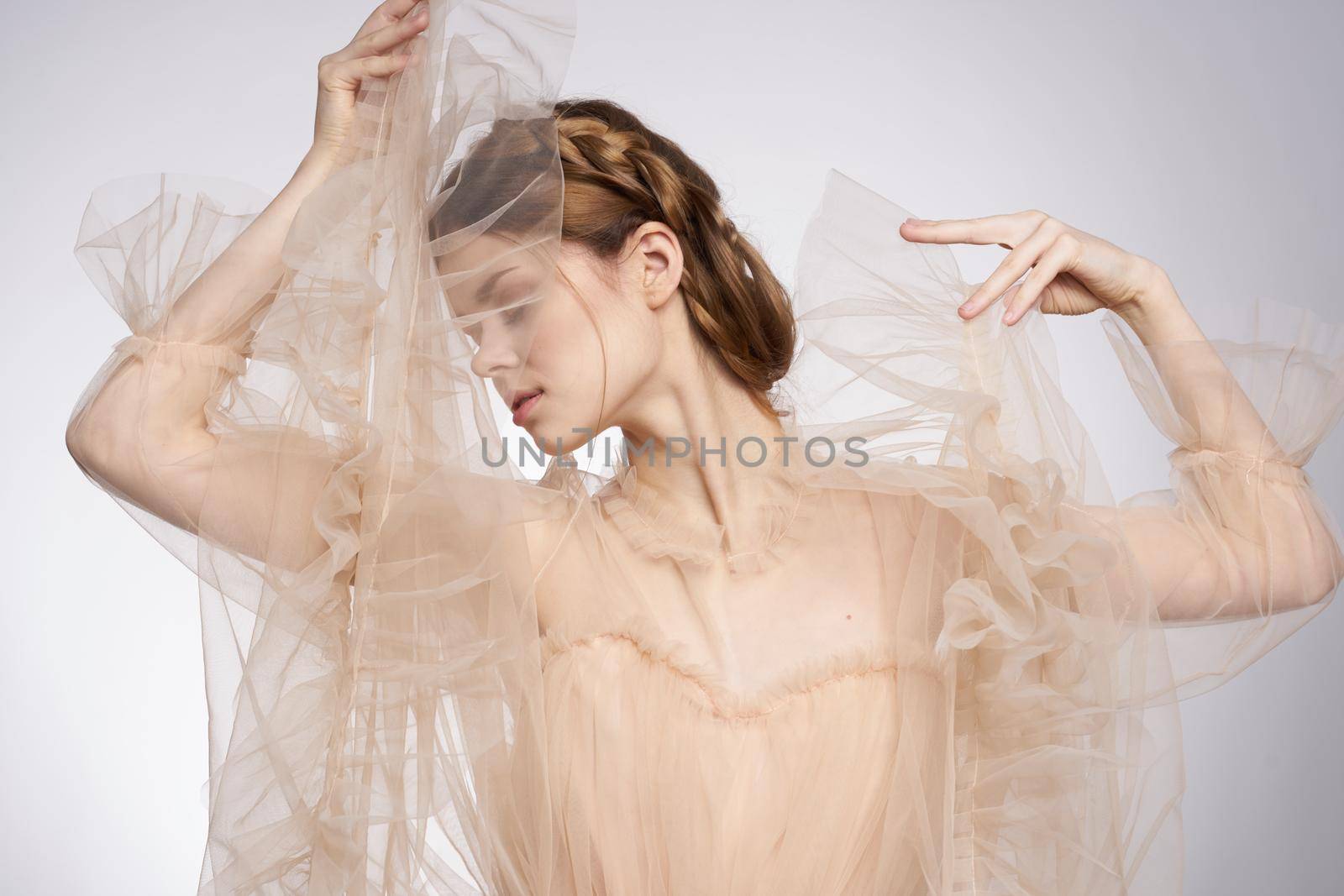 beautiful woman gesture hands cosmetics fashion hairstyle posing model studio. High quality photo