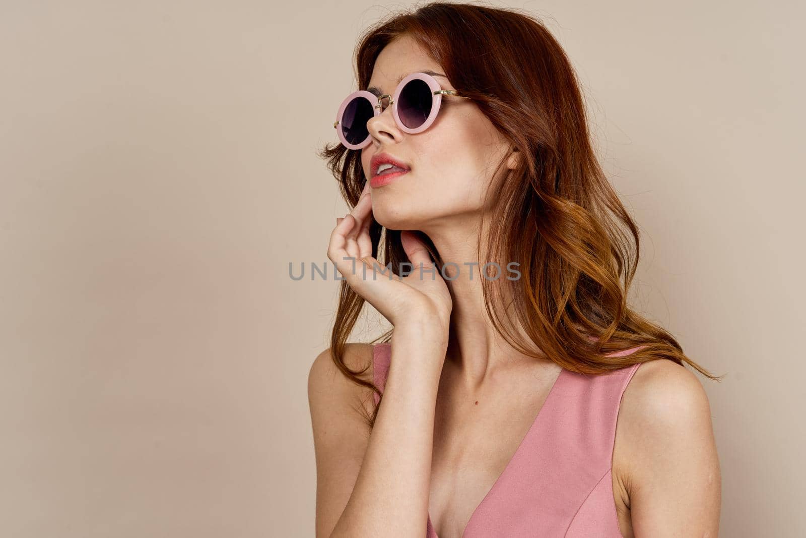 pretty woman in pink dress decoration posing model. High quality photo