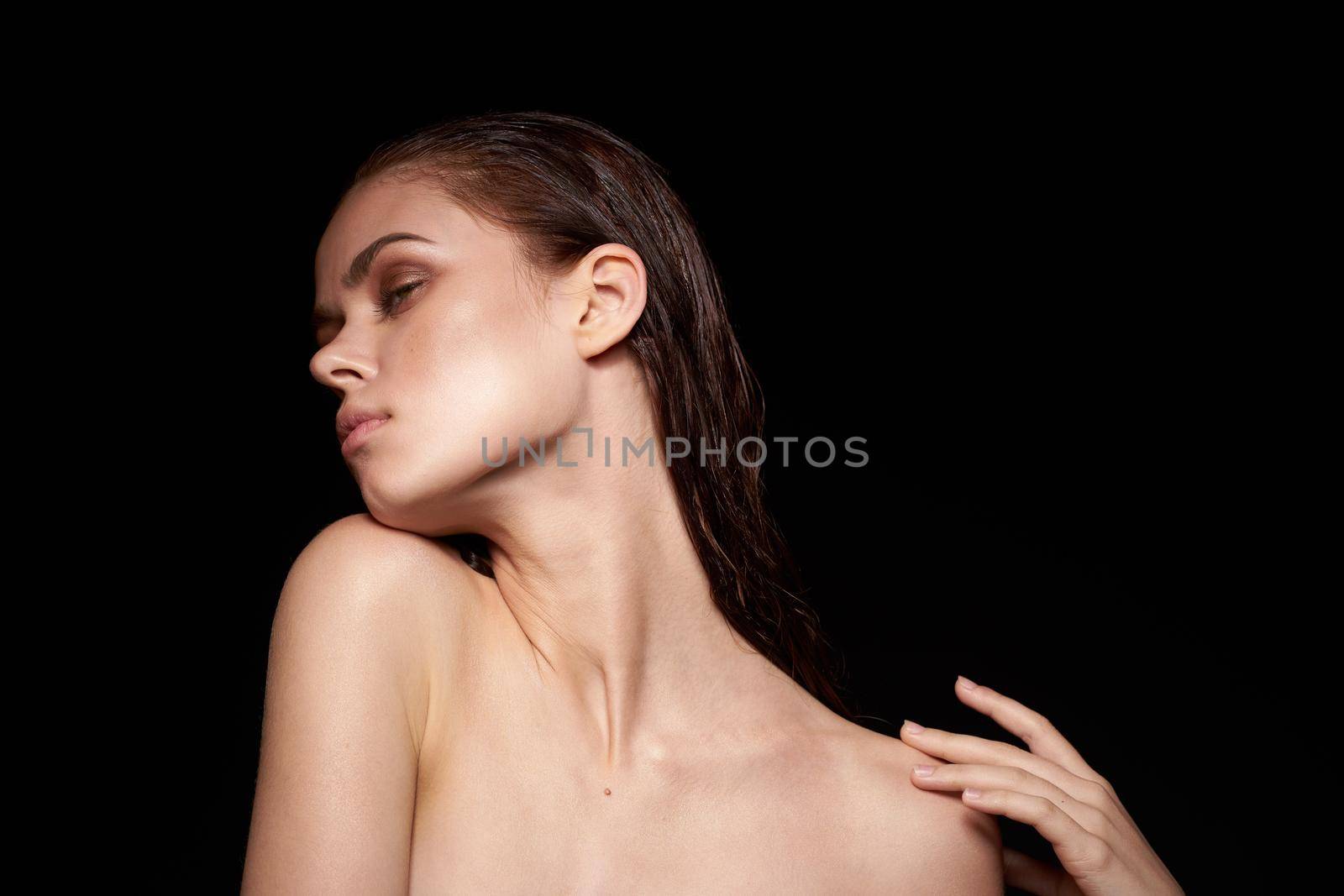 beautiful woman emotions gesture hands bare shoulders close-up. High quality photo