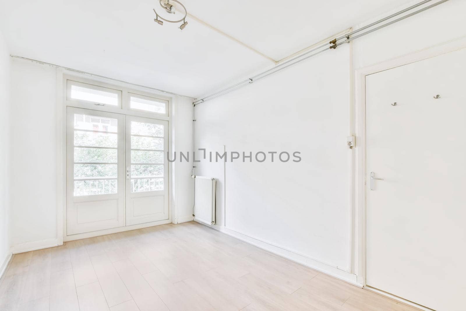 Spacious bright and pretty room with large windows