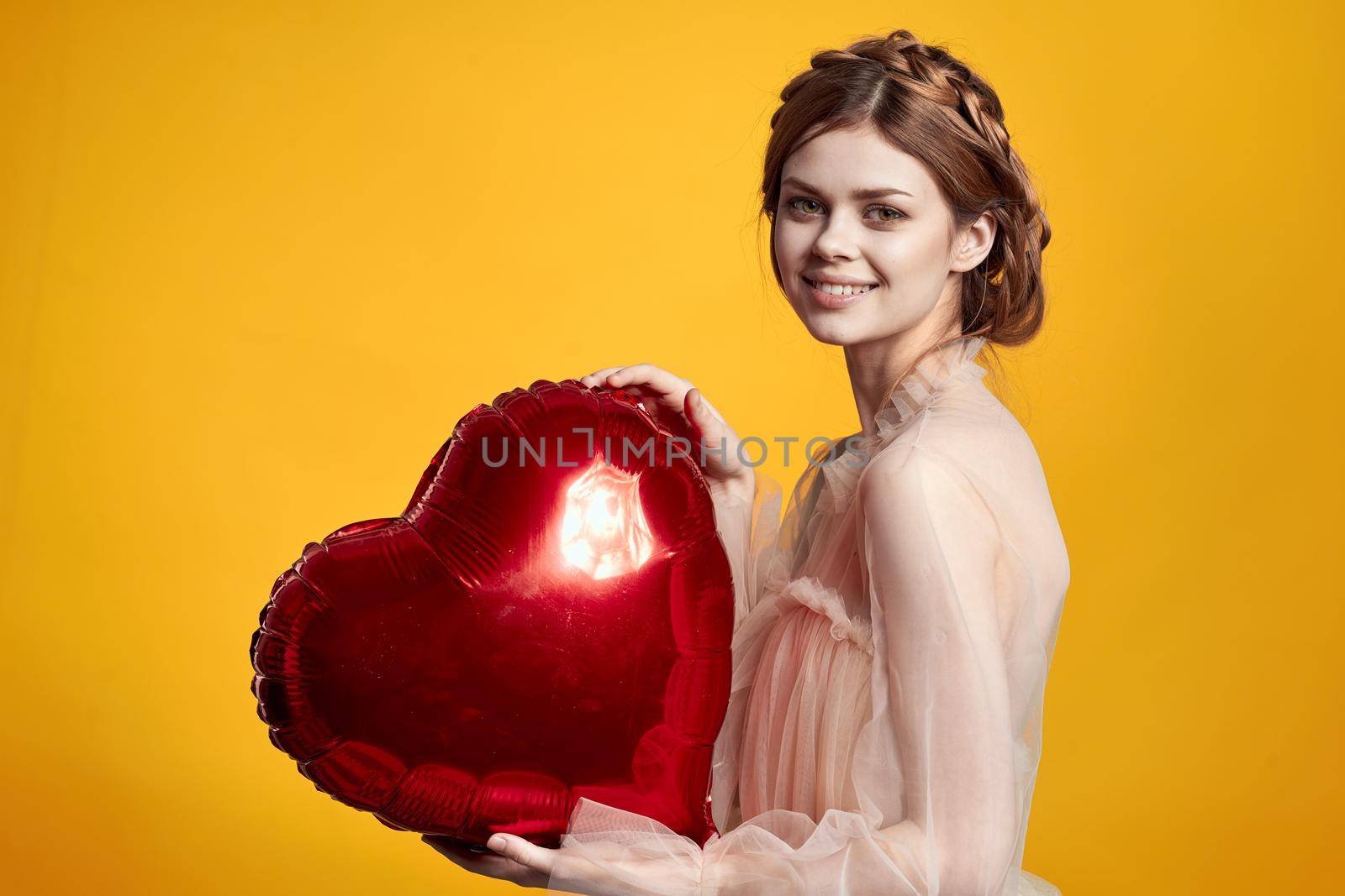 portrait of a woman heart balloon holiday Valentine's Day isolated background by Vichizh