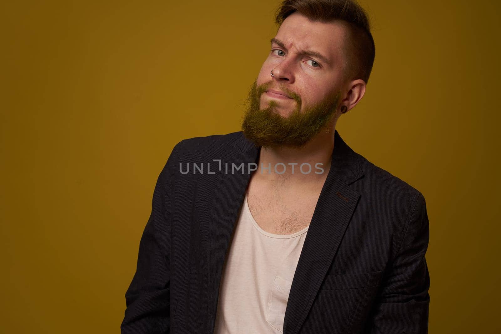bearded man fashionable hairstyle jacket posing self confidence by Vichizh