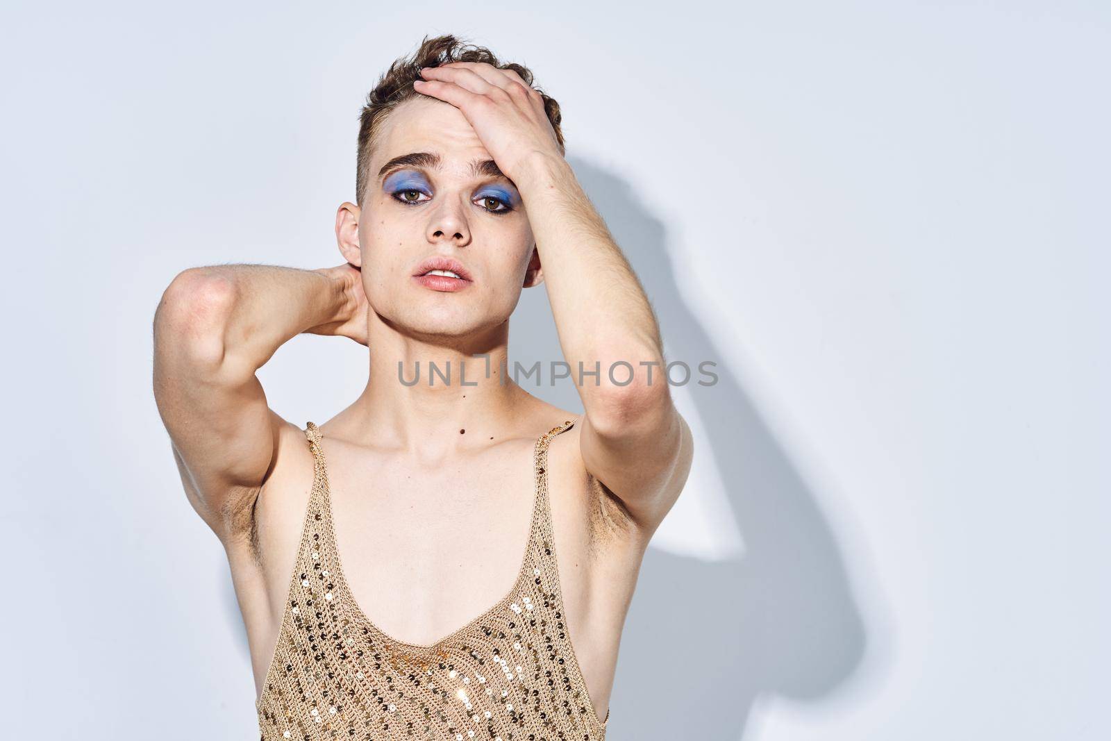 man with female makeup dress posing fashion transgender. High quality photo