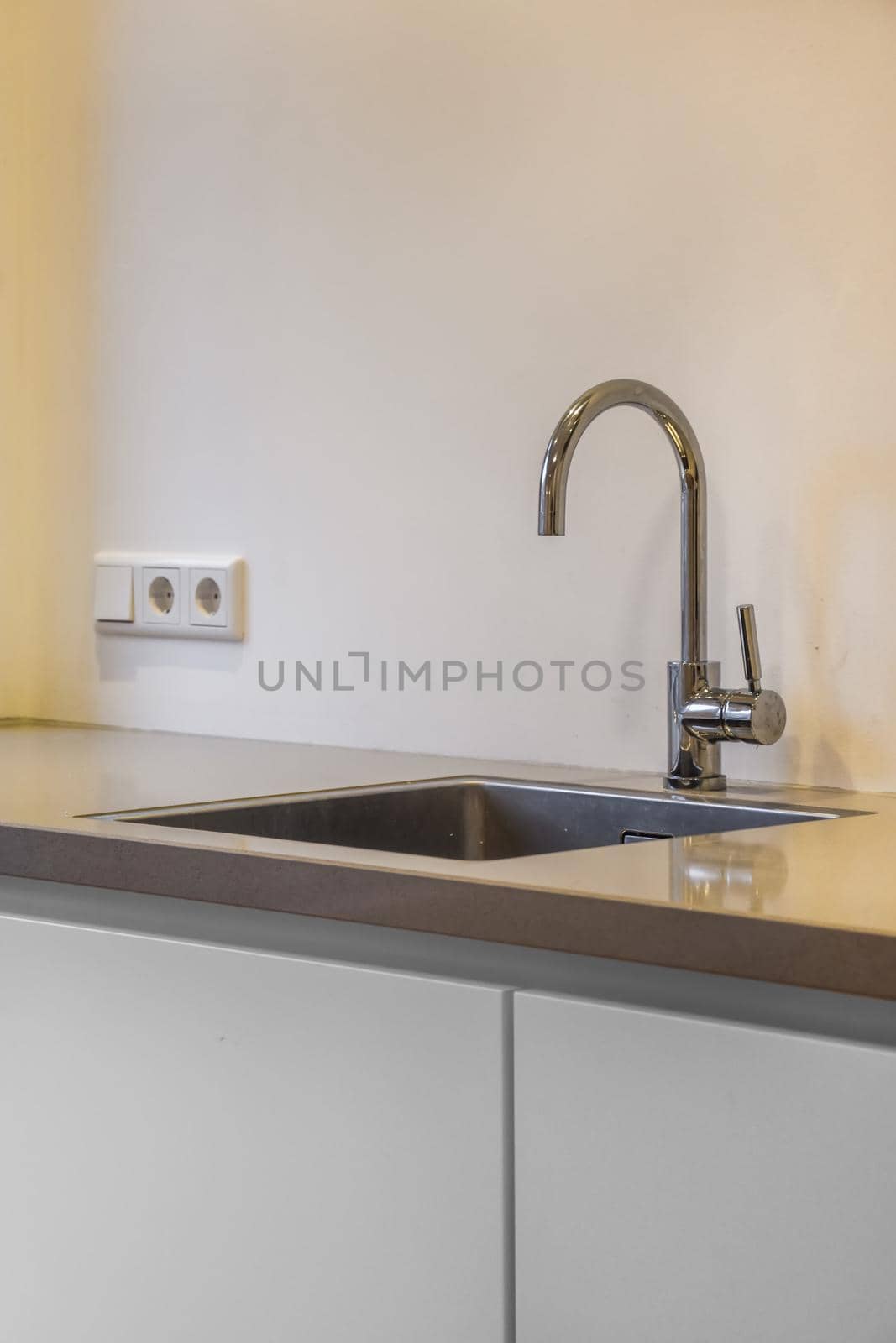 Close up of elegant sink in luxury kitchen