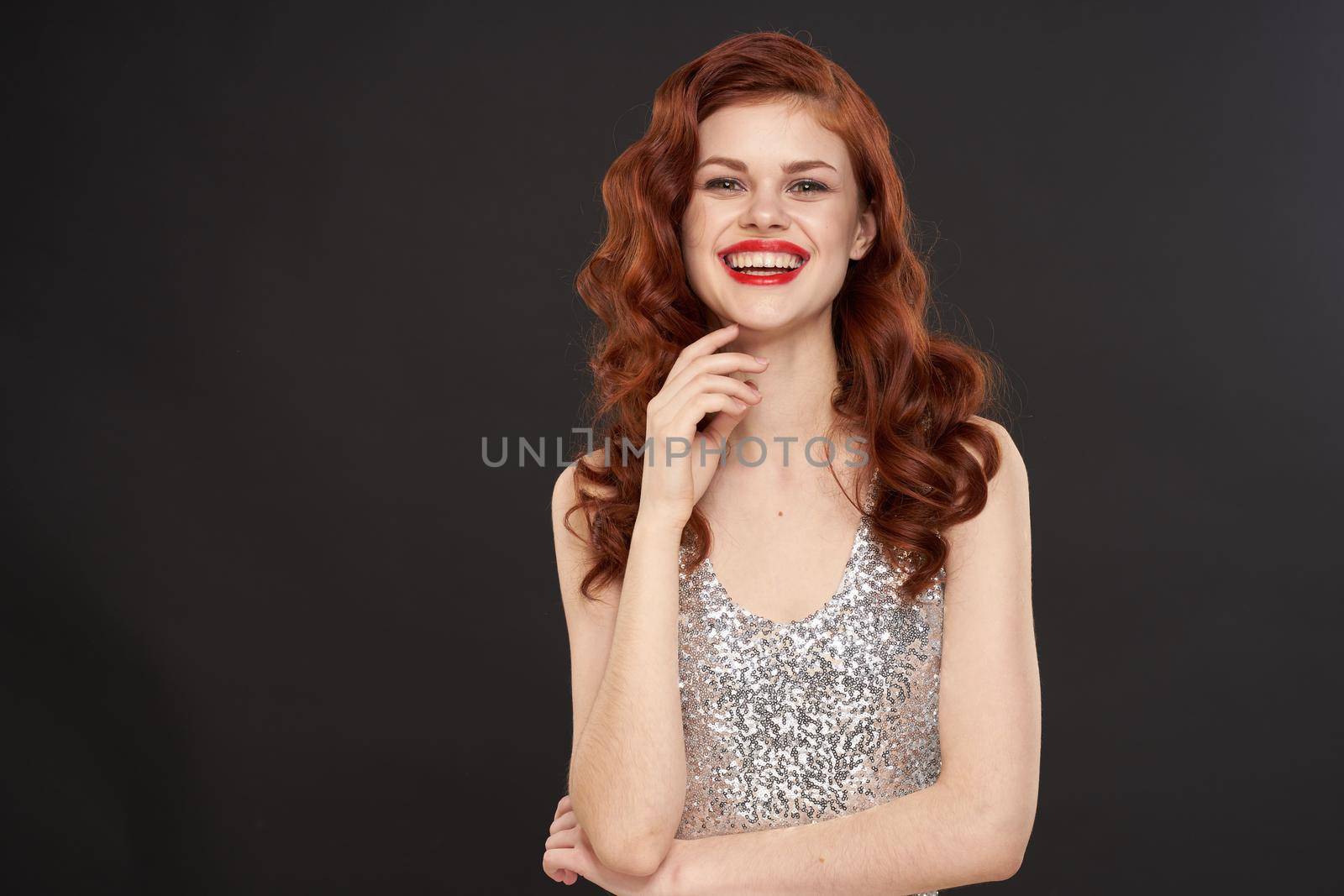 red-haired woman bright makeup glamor posing evening dresses by Vichizh