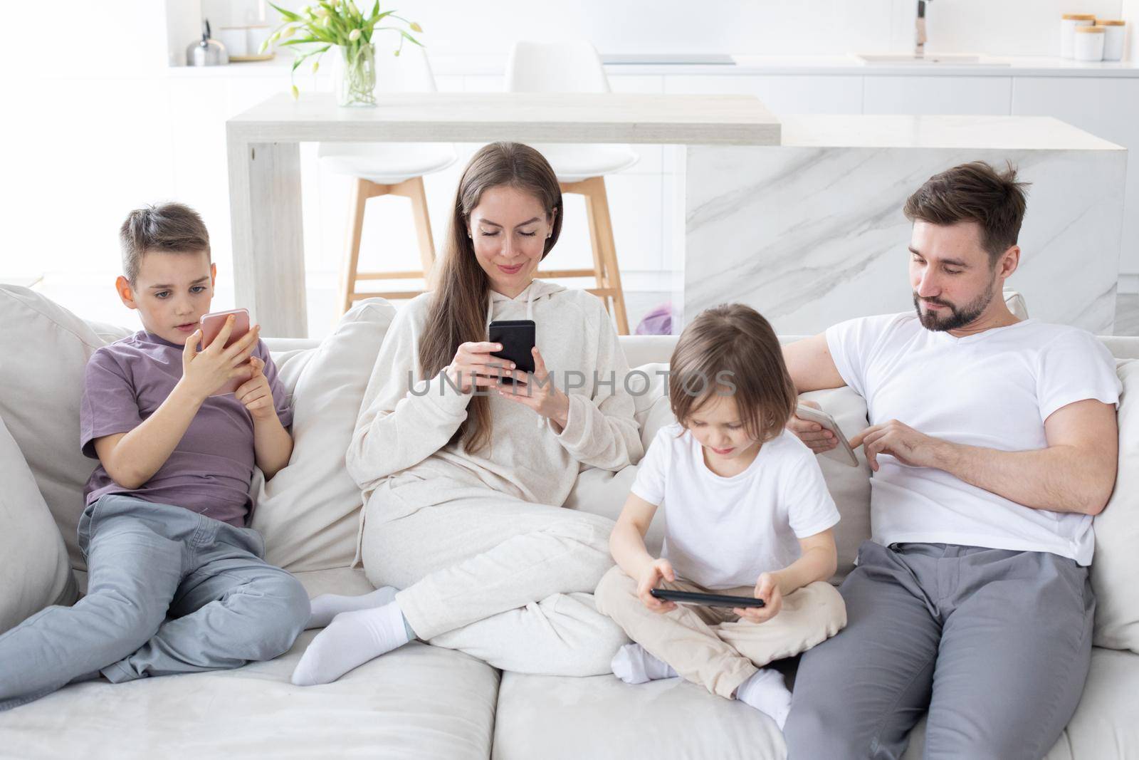 Parents and kids use devices together by ALotOfPeople