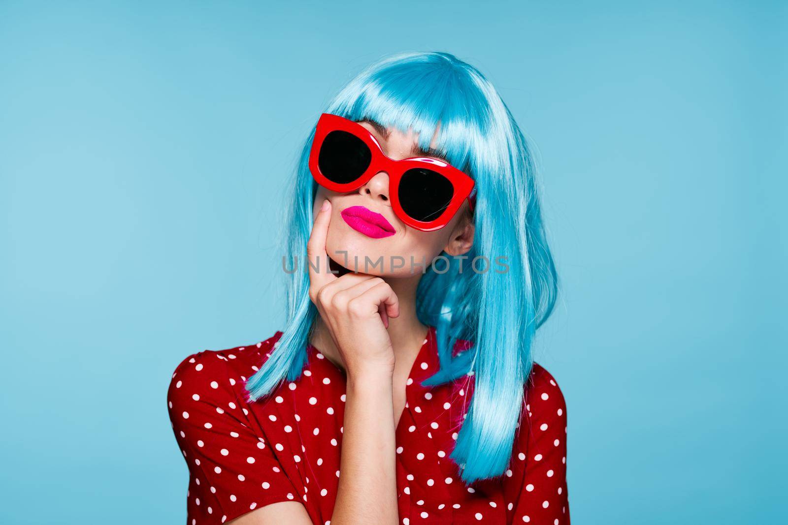 beautiful woman in blue wig sunglasses Glamor close-up. High quality photo