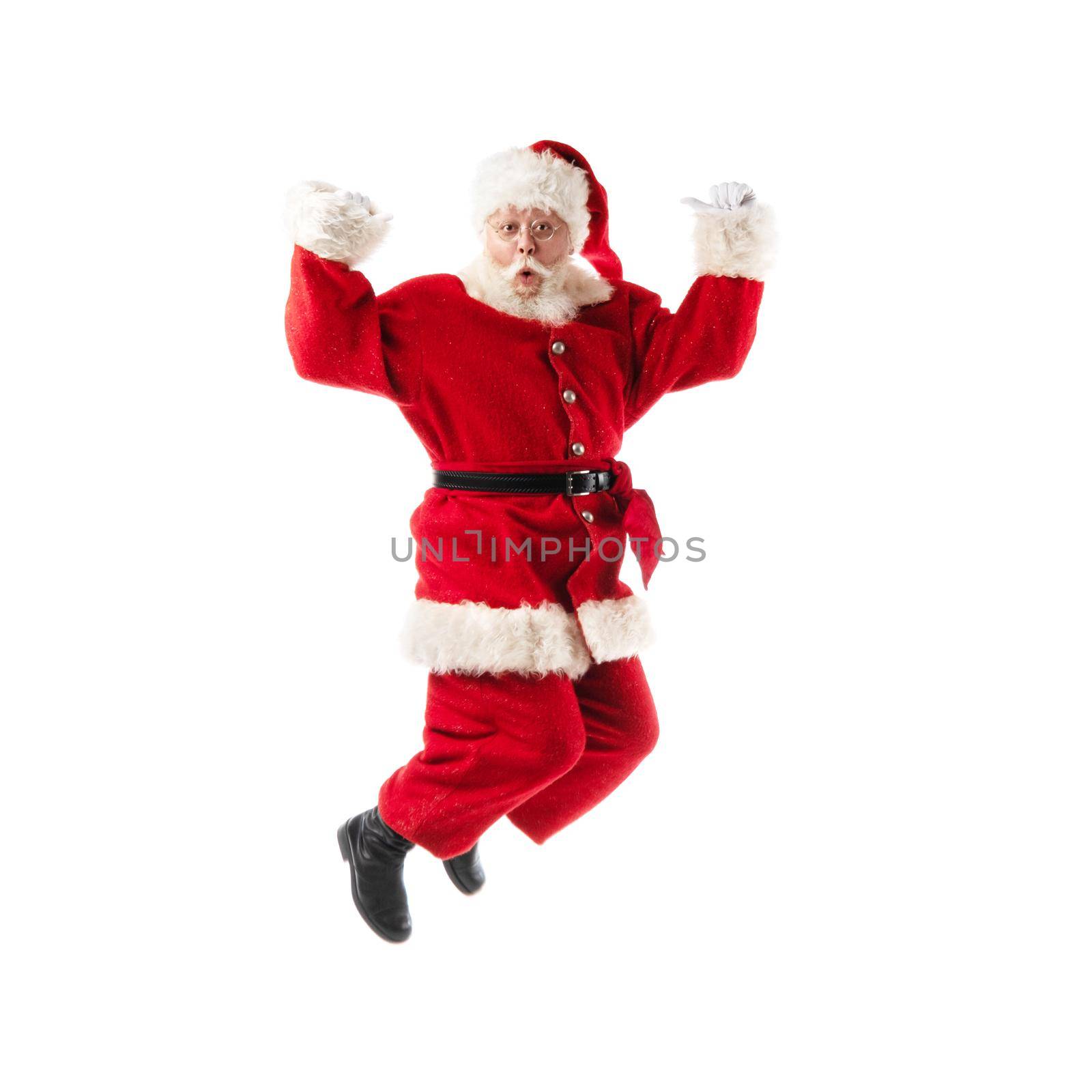 Santa Claus jumping isolated on white by ALotOfPeople