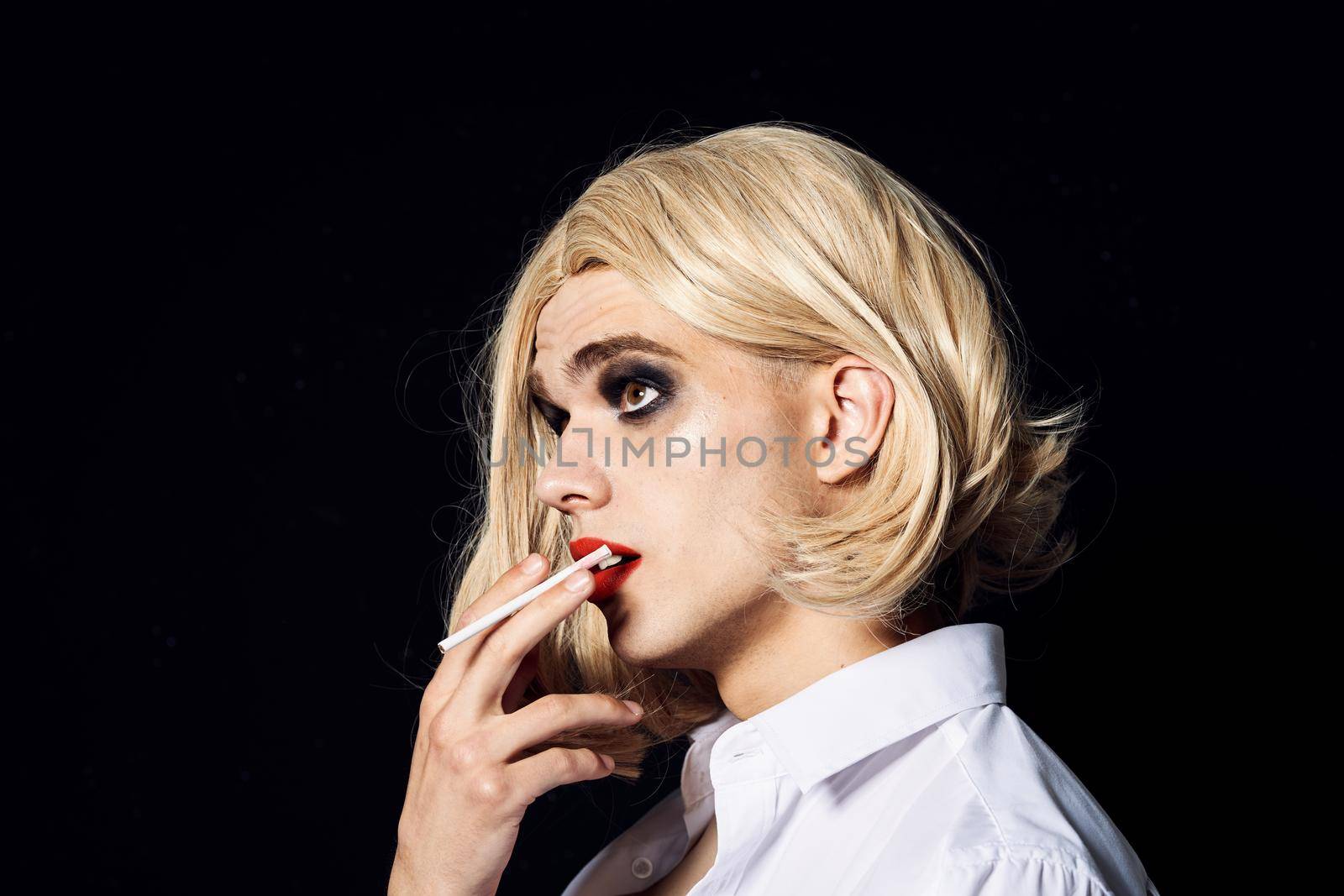 man in womens wig crossdresser makeup lgbt community. High quality photo