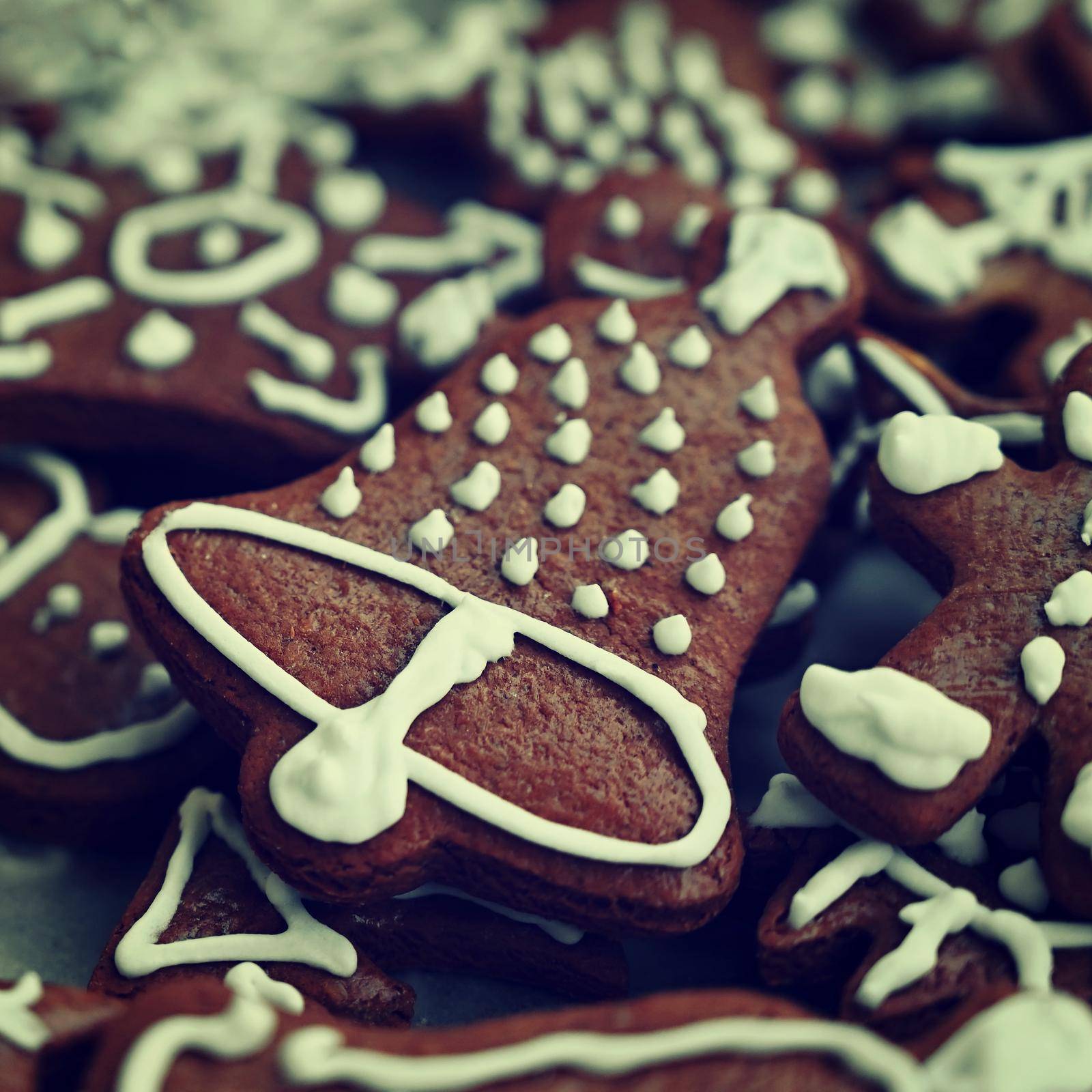 Christmas sweets. Beautiful hand decorated traditional Czech Christmas gingerbread cookies with icing. by Montypeter