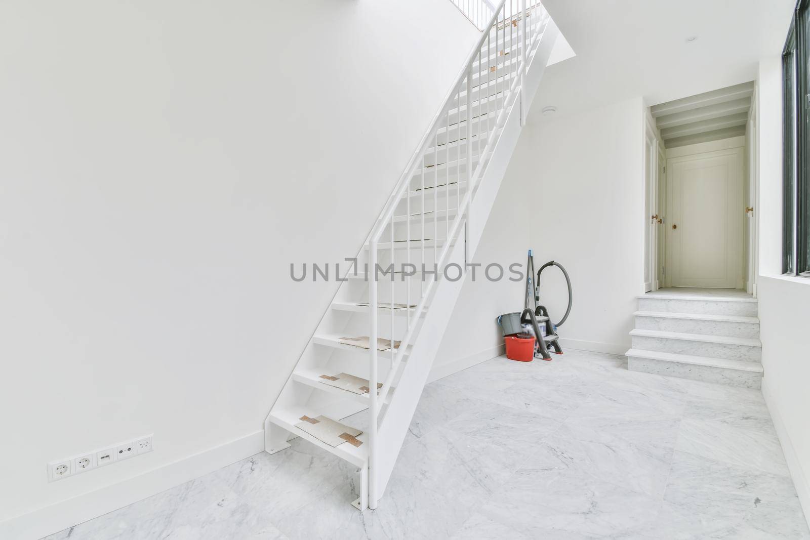 Magnificent bright room with a comfortable staircase