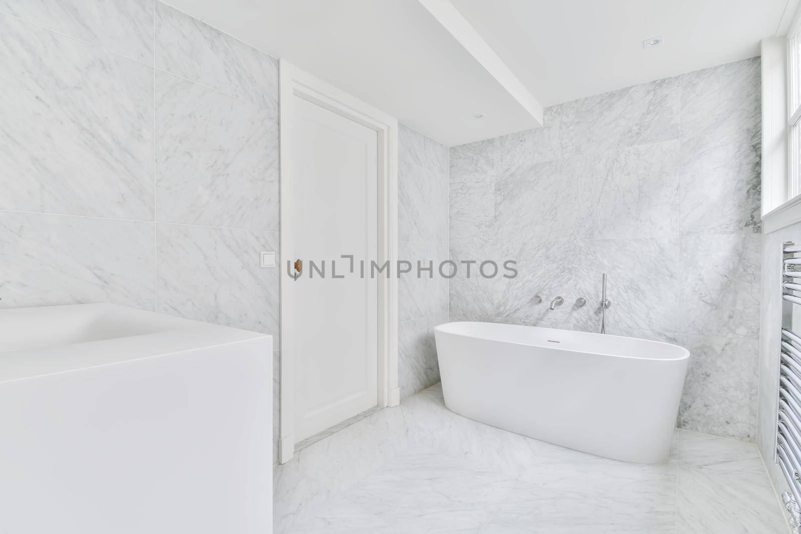 Interior design of an elegant white bathtub