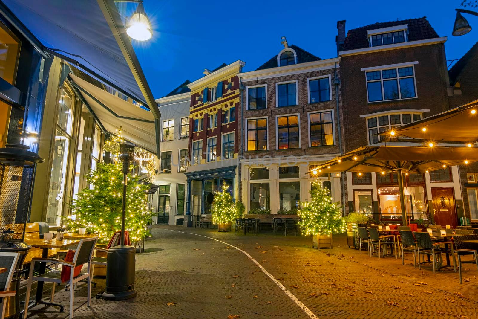 Downtown in the city center from Deventer at christmas time in the Netherlands at sunset by devy
