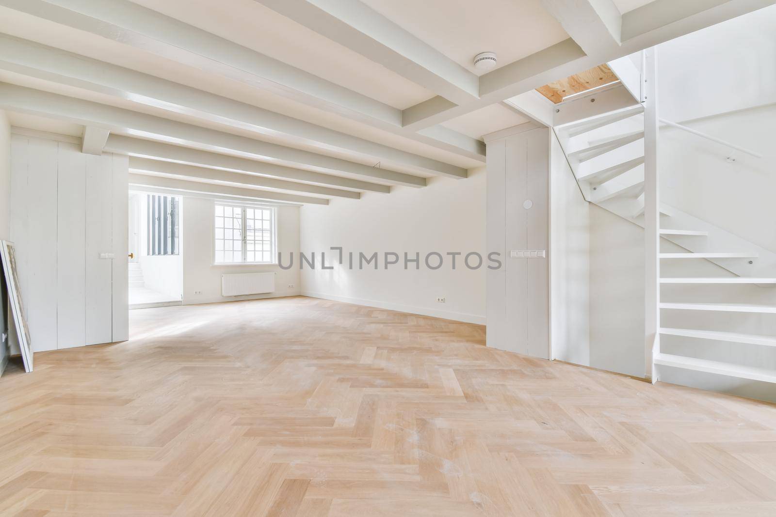 Magnificent bright room with a comfortable staircase