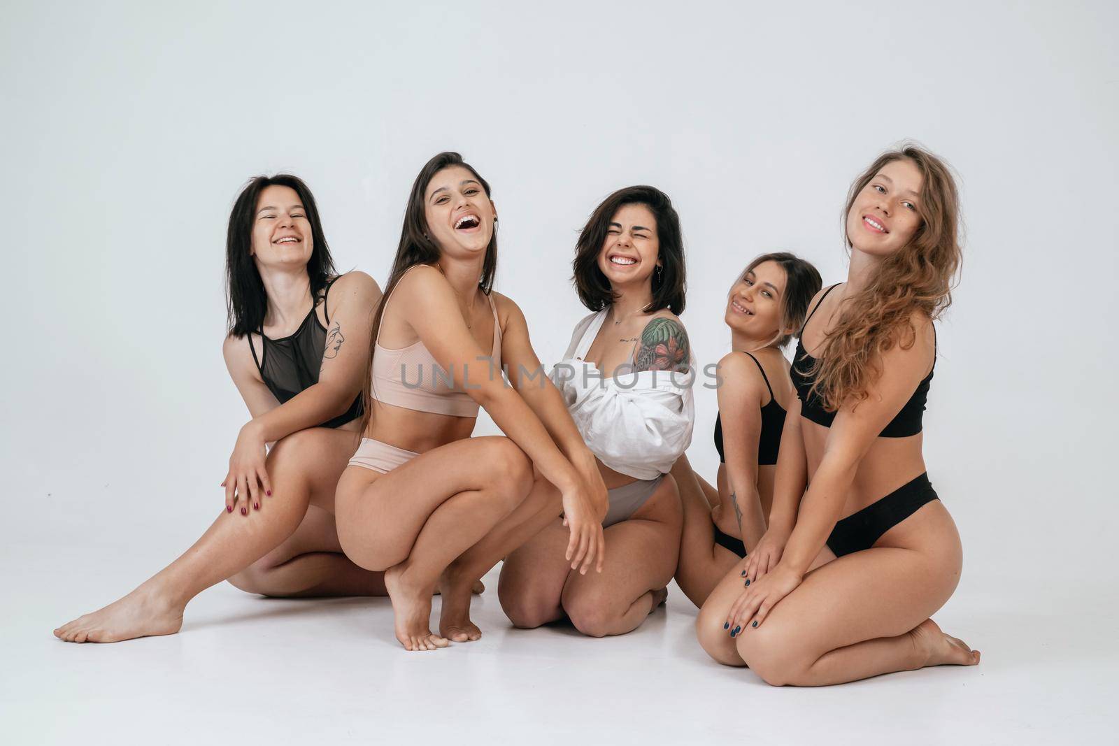 diverse models wearing comfortable underwear, enjoying time together by teksomolika