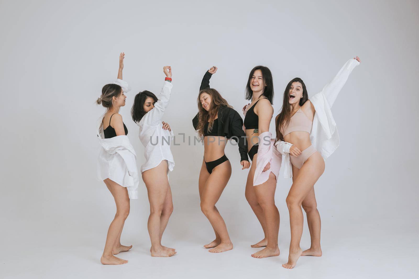 diverse models wearing comfortable underwear, enjoying time together, look at camera having smile and natural unique beauty