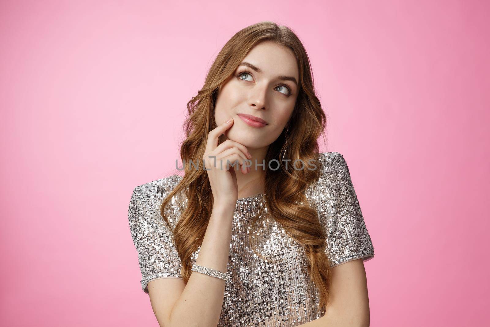Dreamy cute glamour silly woman deciding what order look up thoughtful touching face thinking making decision choice imaging prince on white horse, smiling carefree pink background.