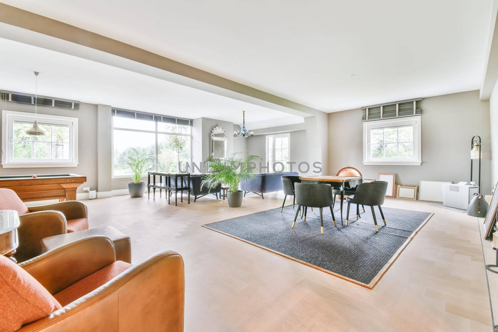 Stunning dining room with plush comfy and padded chairs and a small table