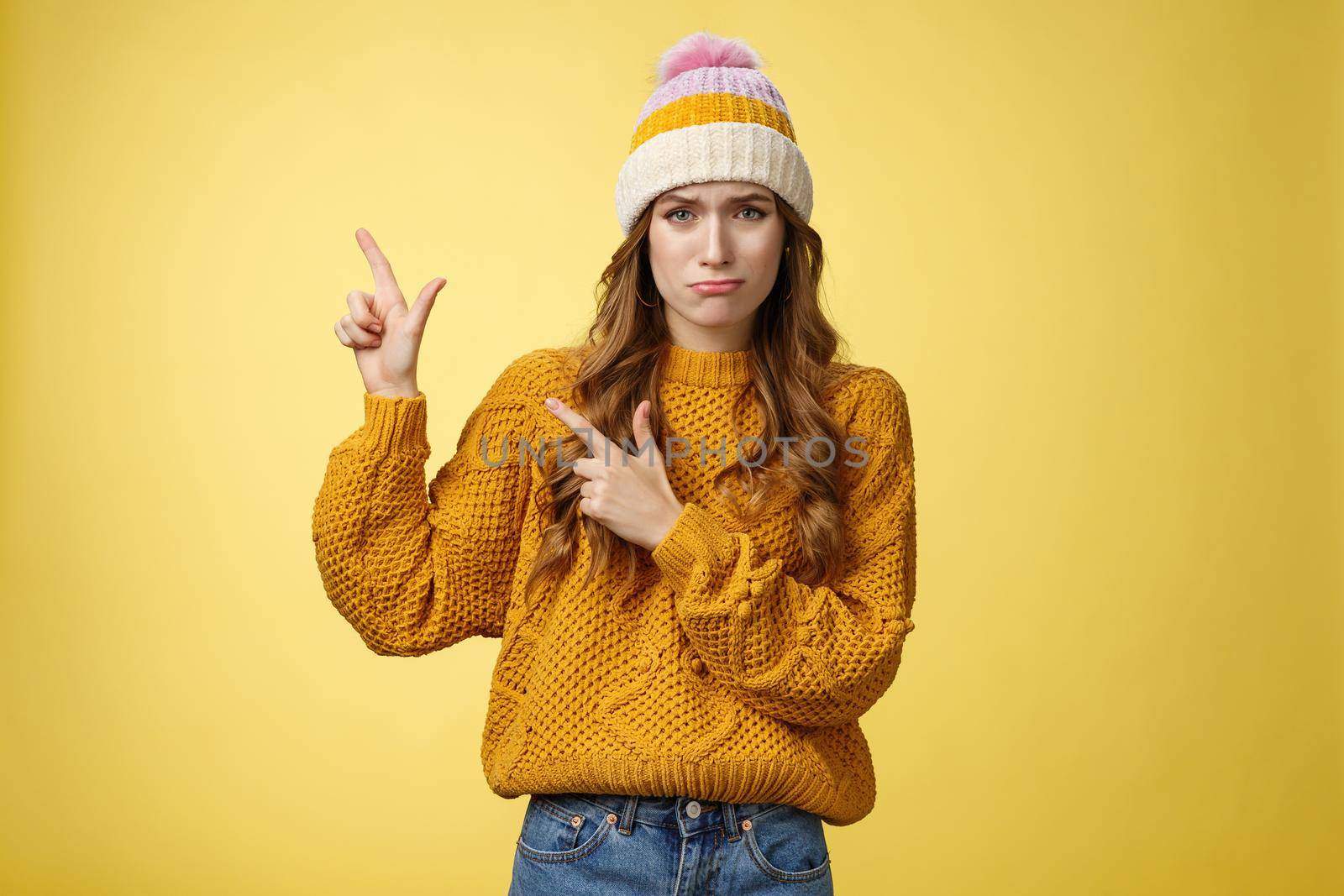 Timid insecure sobbing cute girlfriend offended pointing bad guy show left side whining lip trembling complaining was insulted, standing upset crying miserable, posing yellow background by Benzoix