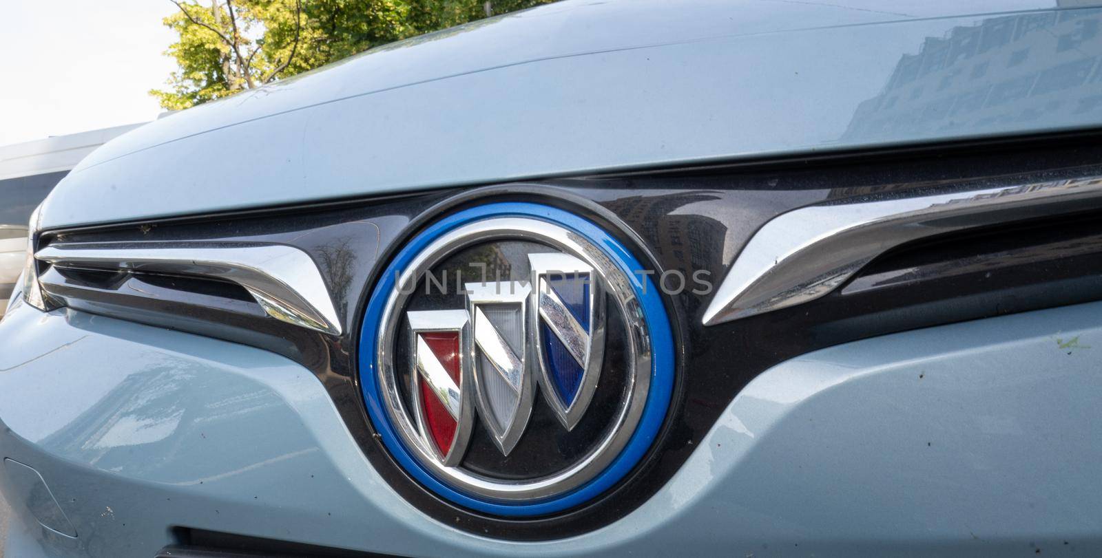 Logo of Chinese Electric vehicle Buick VeLite 6 on streets of Kyiv, near EV charging station. General Motors family next generation electric car based on Chevrolet Bolt technology . 17th of june 2021 Kyiv, Ukraine,. High quality photo