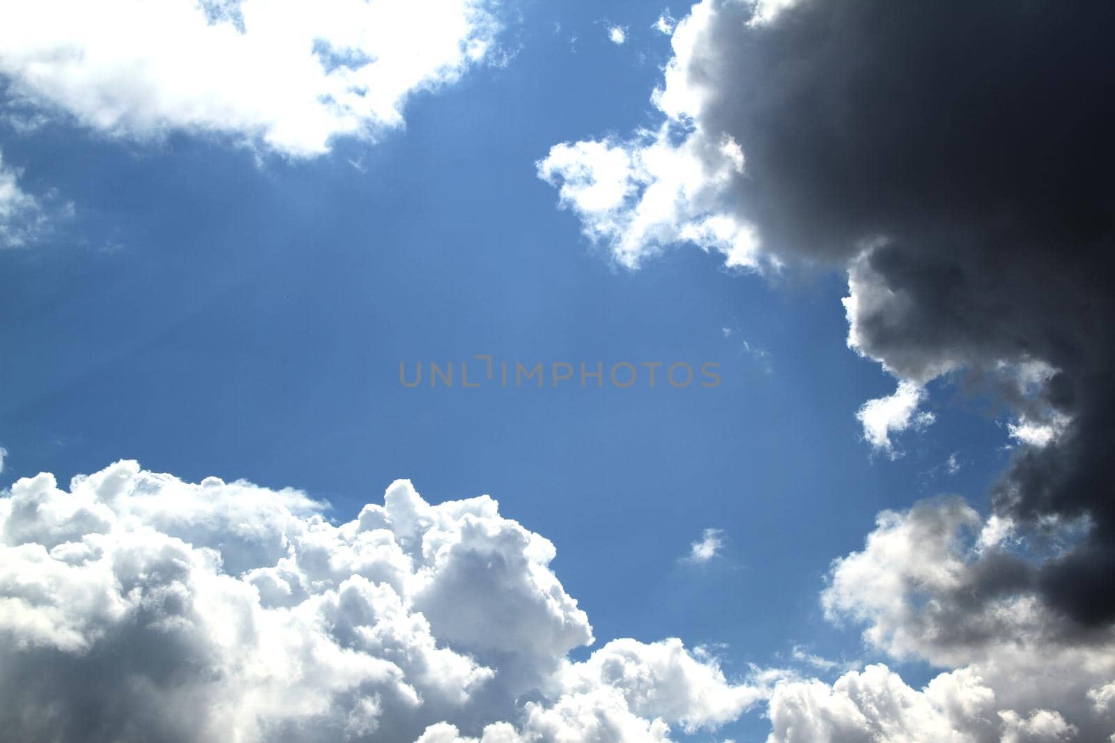 Blue sky with large snow - white clouds by BEMPhoto