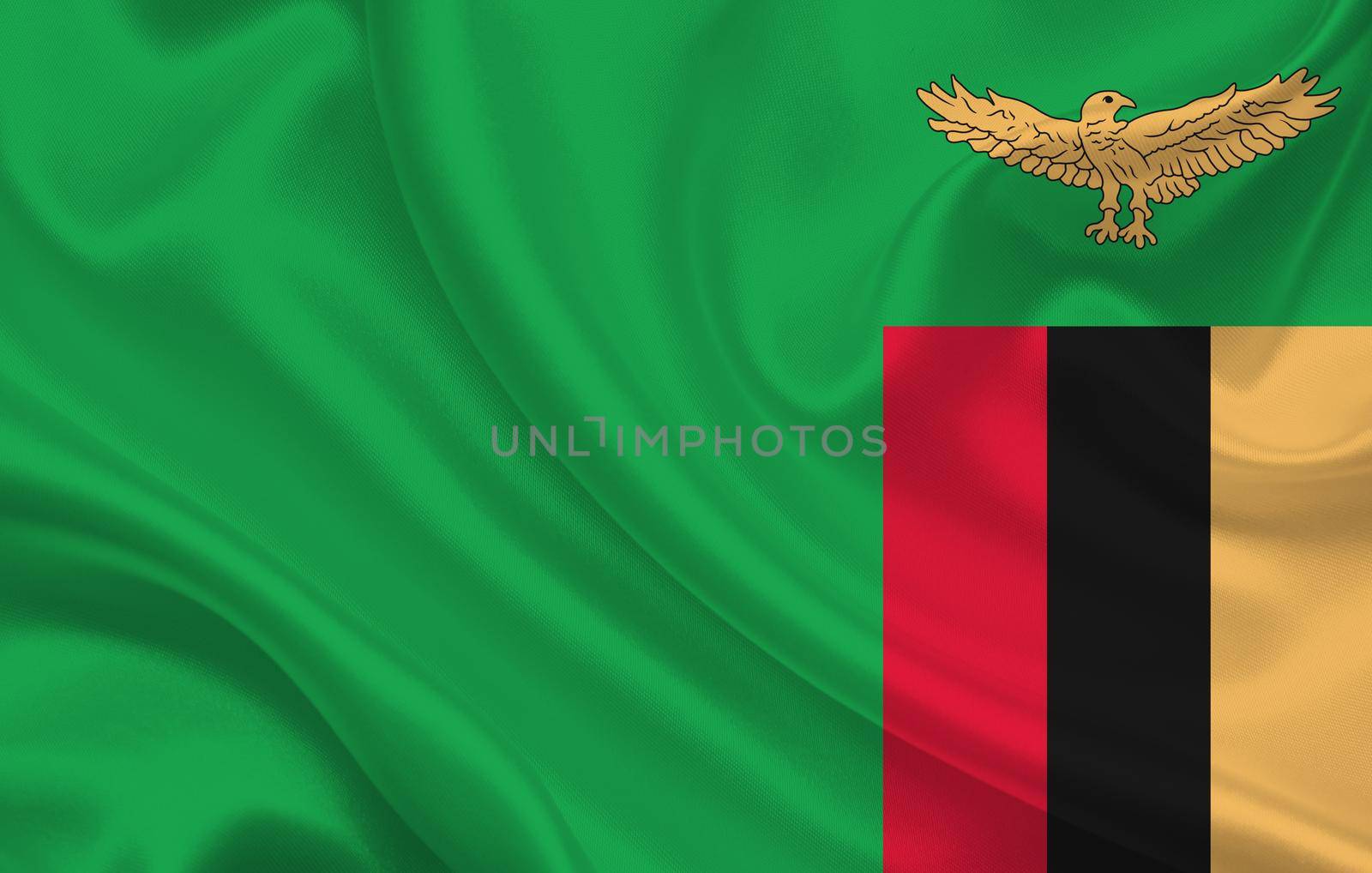 Zambia country flag on wavy silk fabric background panorama by BEMPhoto