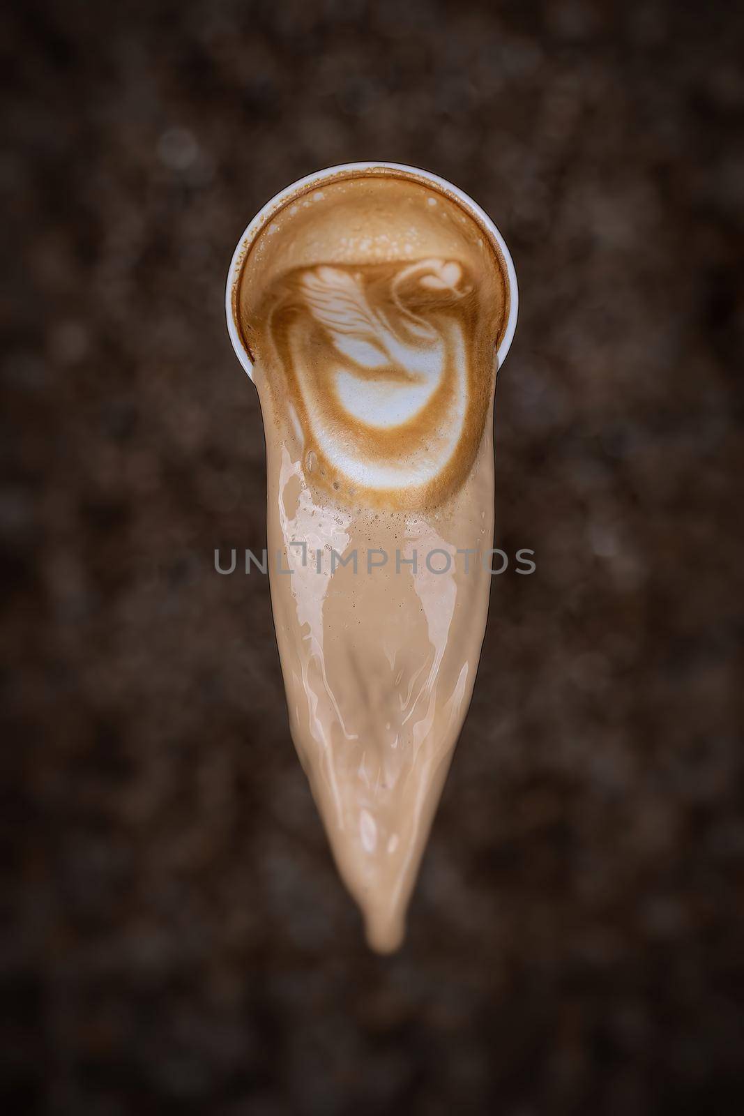 Coffee latte art Prepared and poured out by a barista by Fischeron