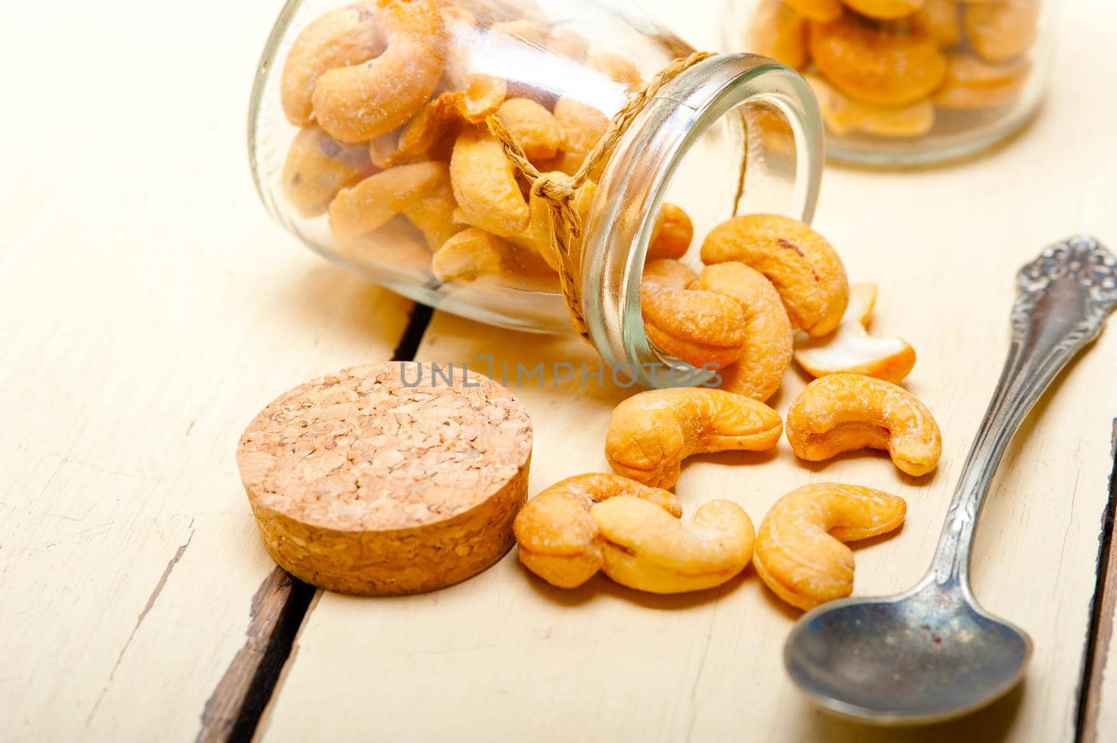 cashew nuts on a glass jar  by keko64