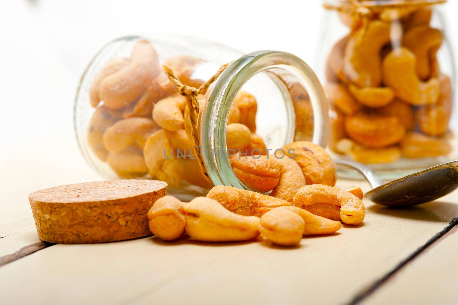 cashew nuts on a glass jar  by keko64