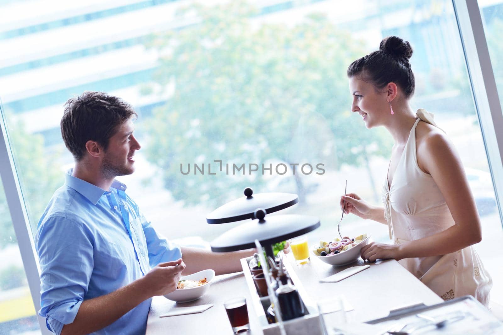young couple at luch by dotshock