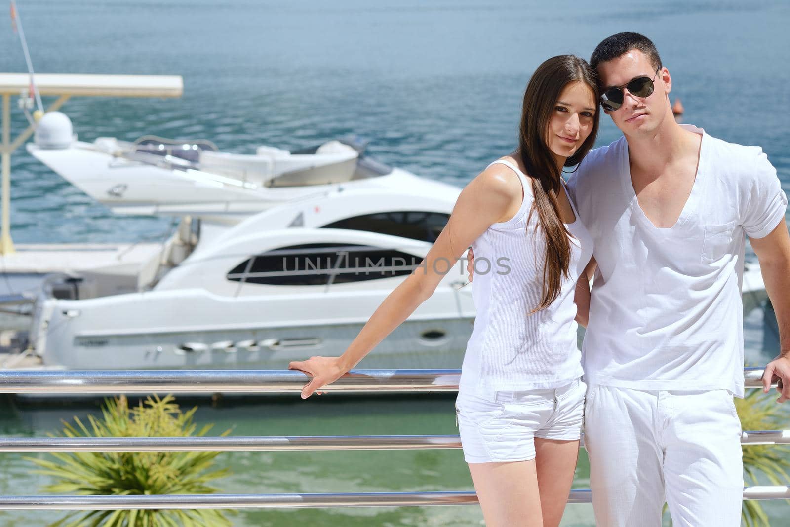 young couple on yacht by dotshock