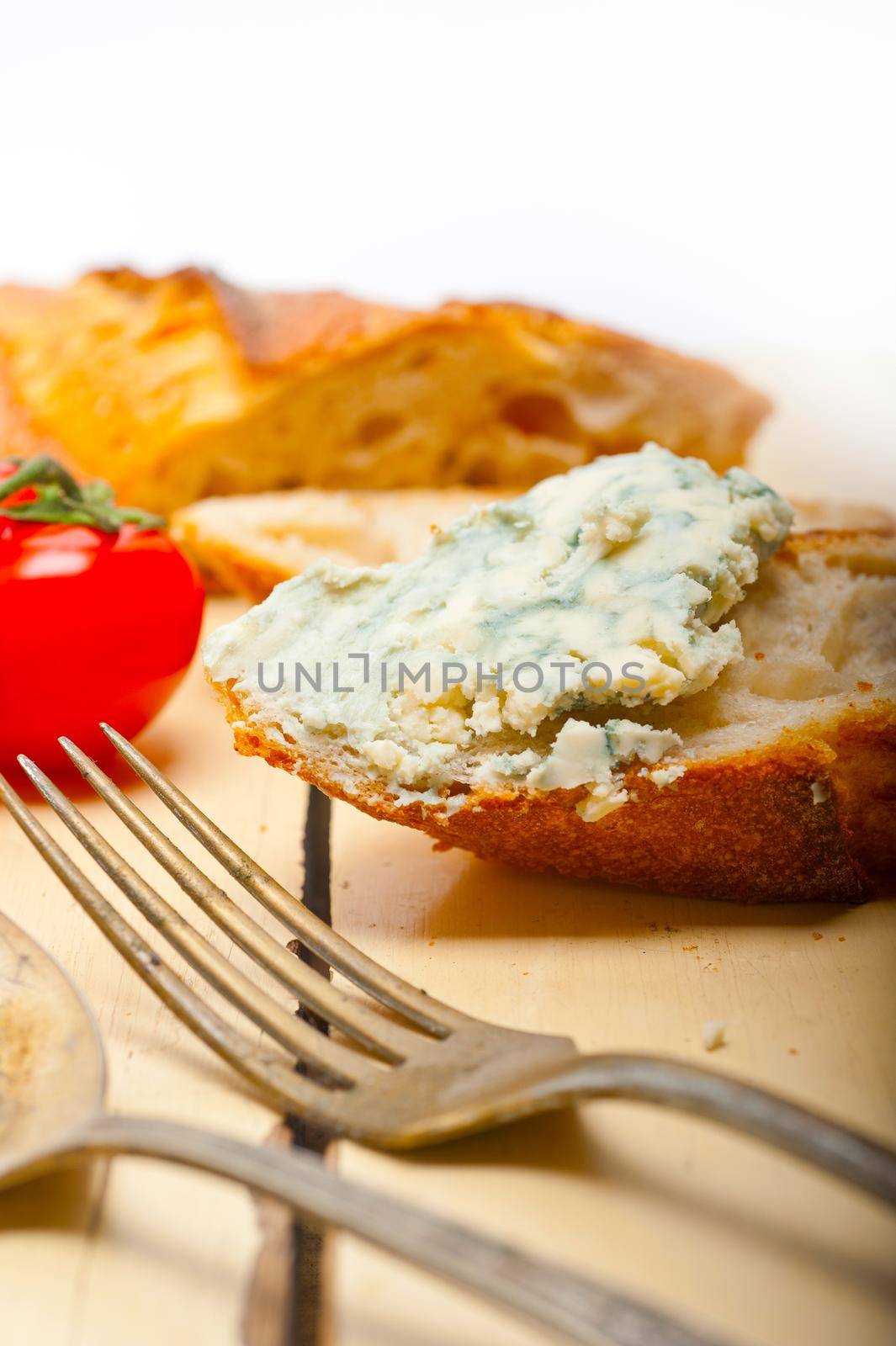 fresh blue cheese spread ove french baguette by keko64