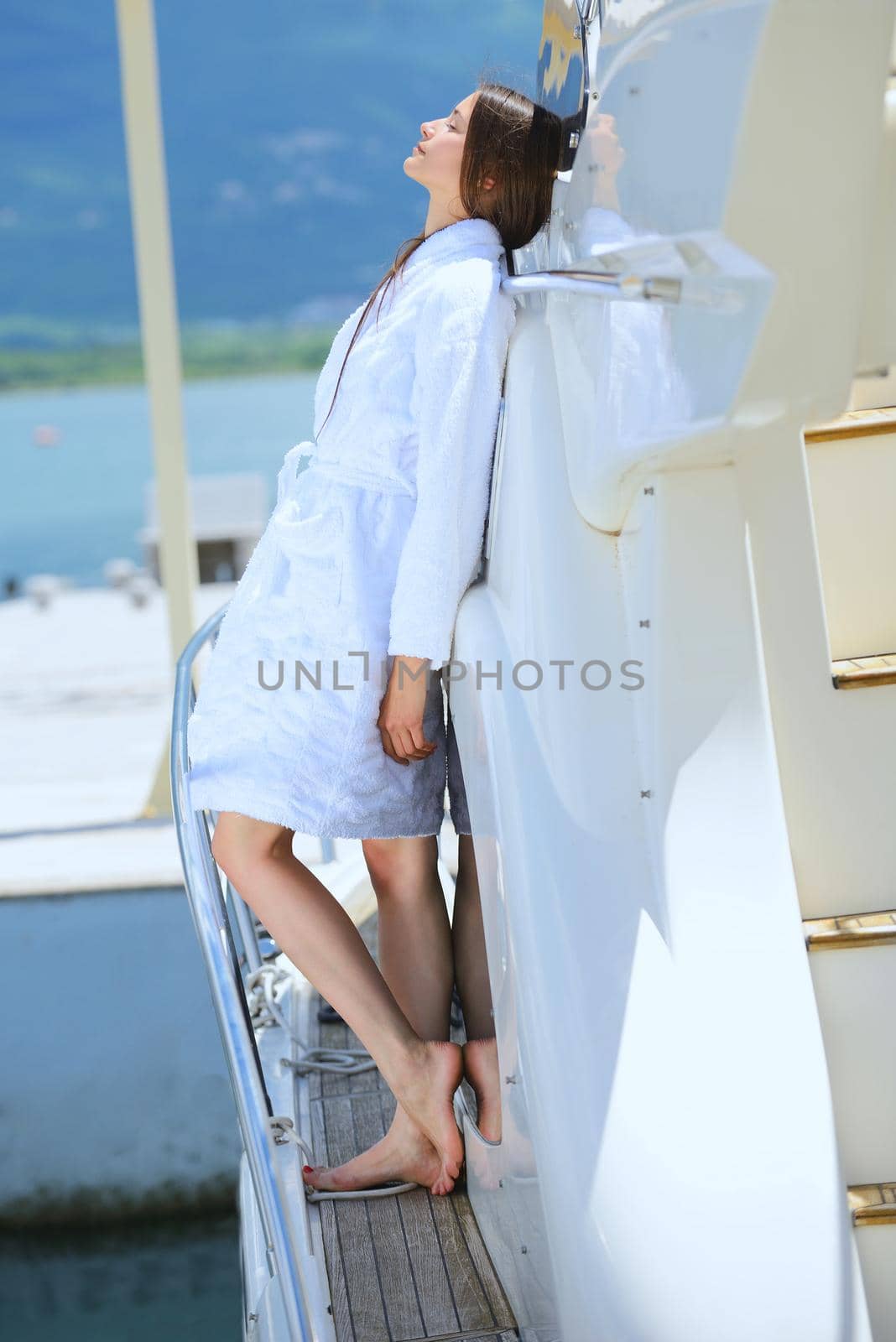 woman on luxury yacht by dotshock