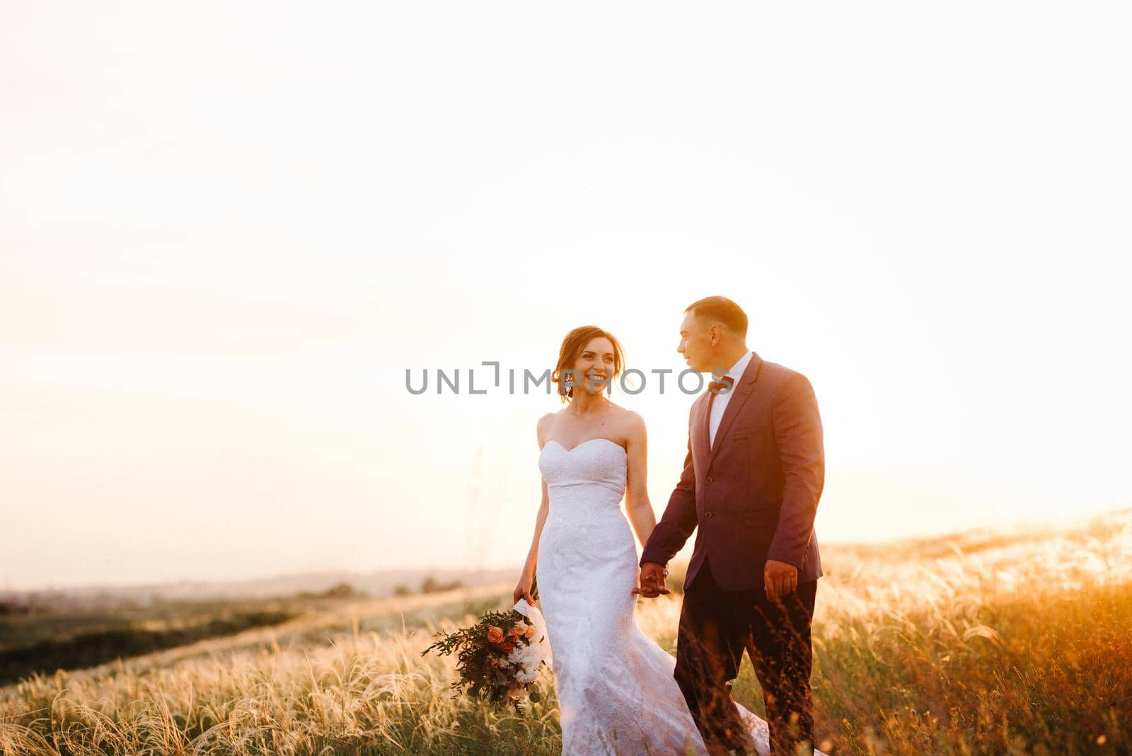 A couple in love a guy and a girl on a walk in the forest belt