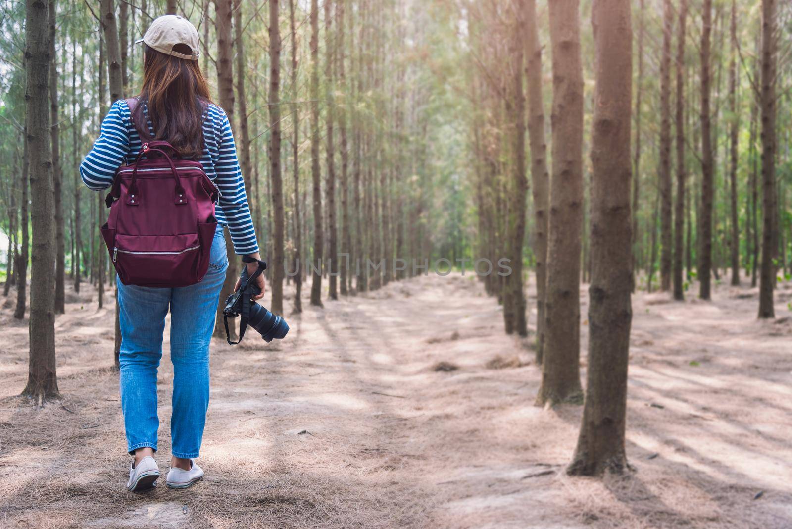 Female woman lifestyle use camera photographer travel taking shooting photo by Sorapop