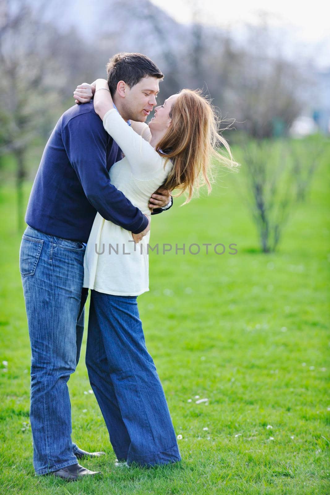 happy couple outdoor by dotshock