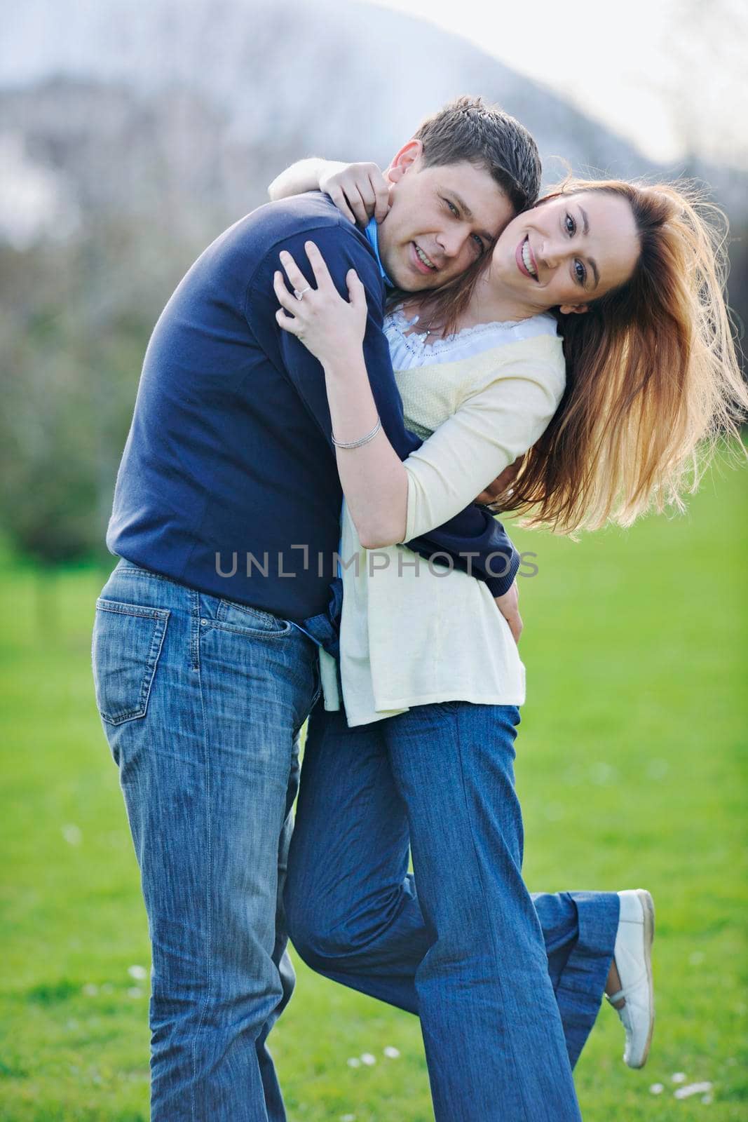happy couple outdoor by dotshock