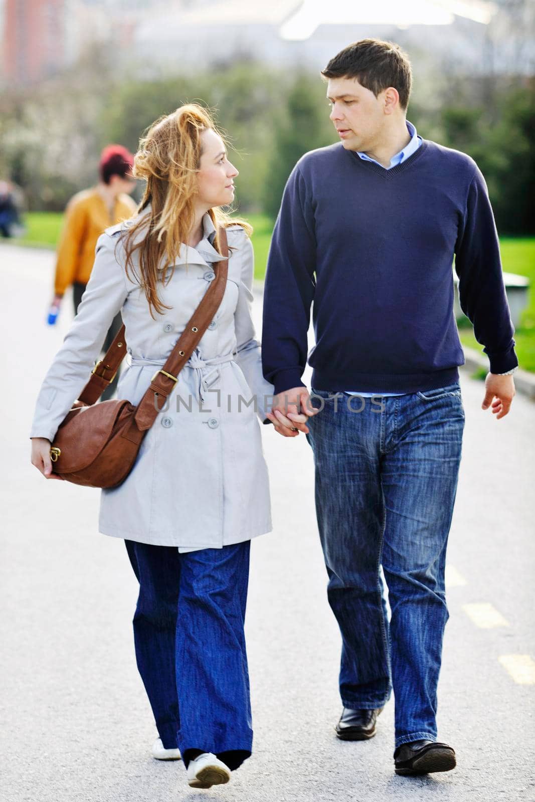 happy young couple have good time and fun outdoor at beautiful sunny day