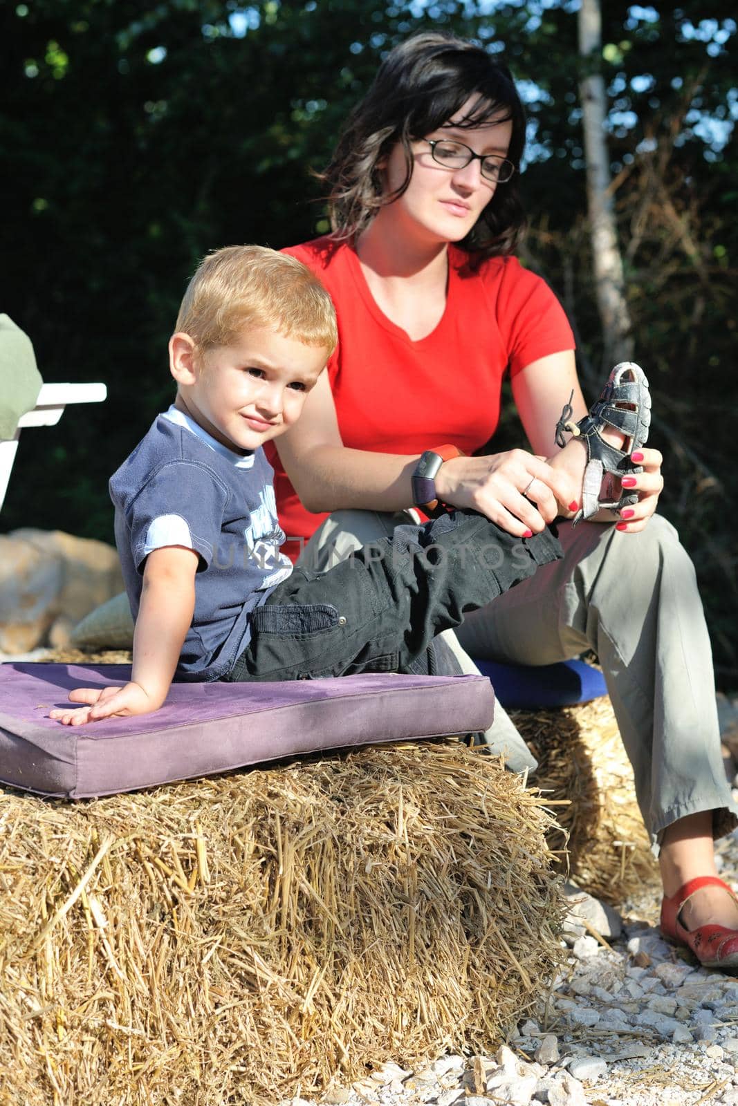 woman and child have fun outdoor at partk in nature