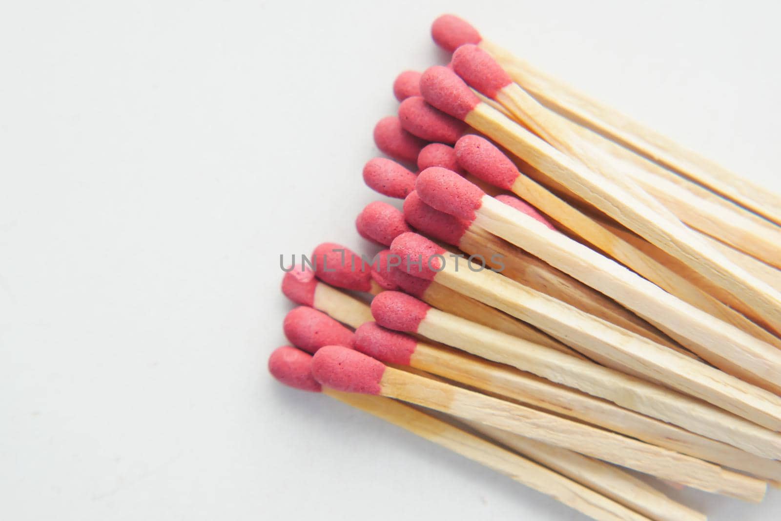 red matches on a white background,