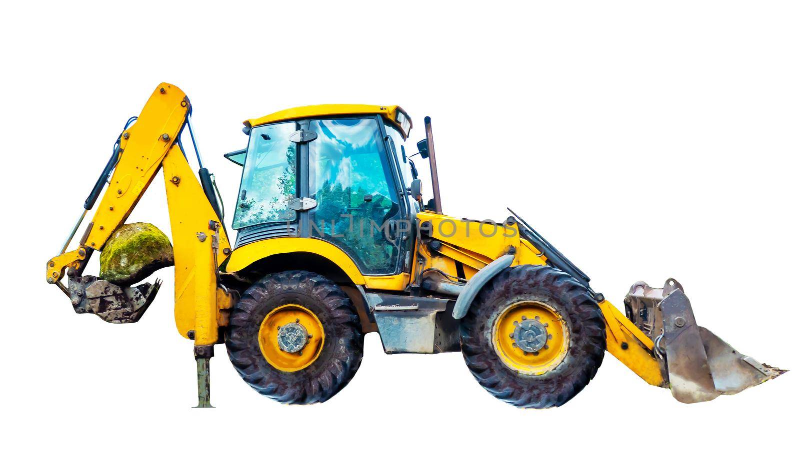 A large yellow multifunctional wheeled tractor isolated on white background. Yellow excavator lifts a stone