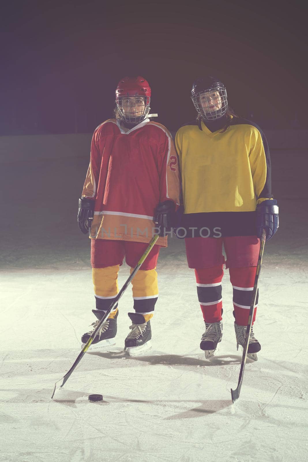 teen girls ice hockey players portrait by dotshock