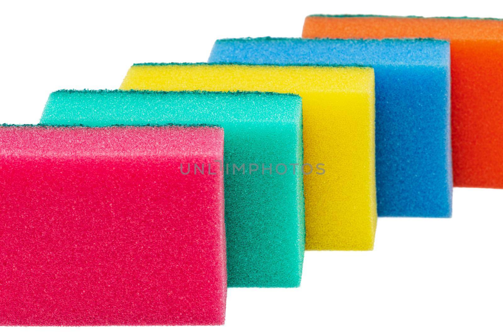 Set of different bright colored foam sponges for everyday cleaning in kitchen and washing dishes by Alexander-Piragis