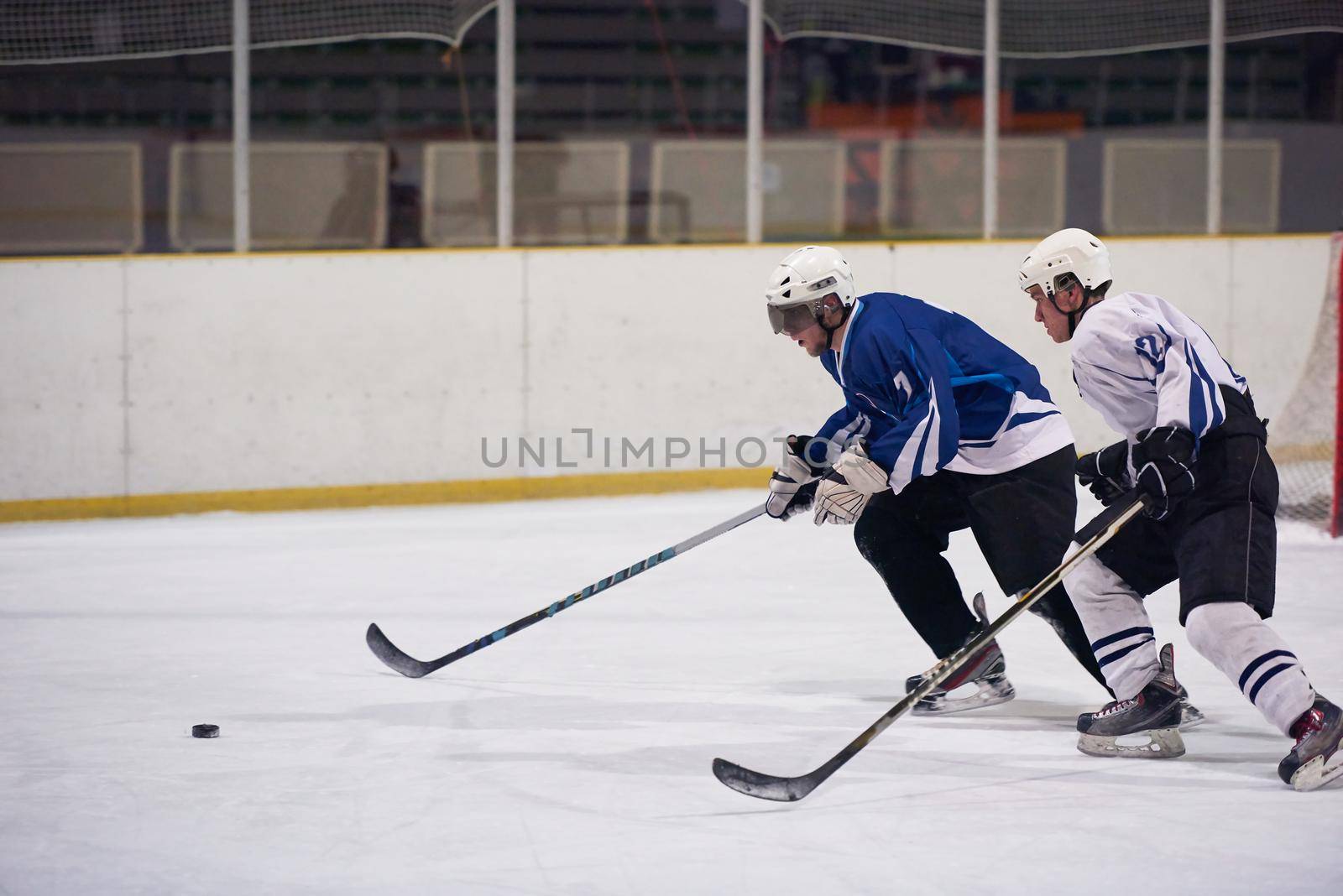 ice hockey sport players in action, business comptetition concpet