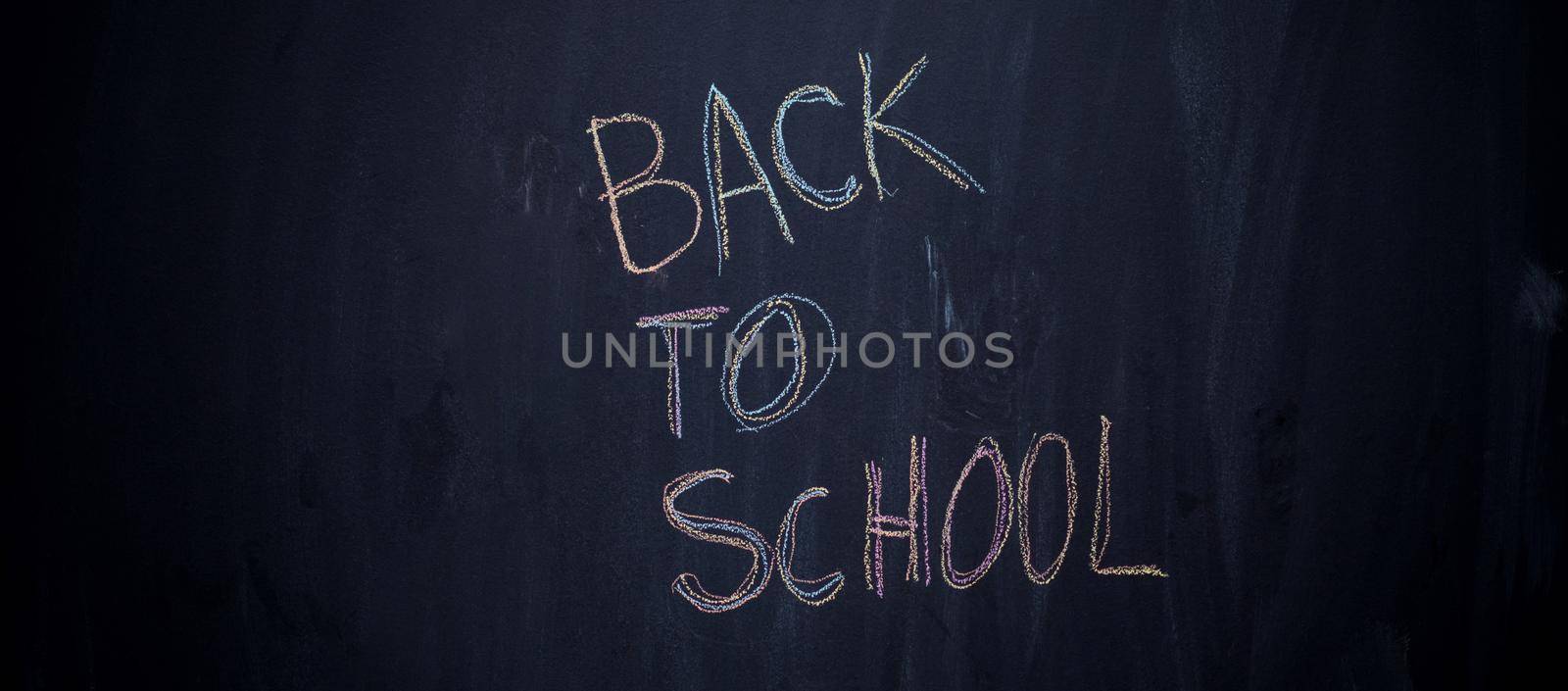 back to school drawing on black chalkboard