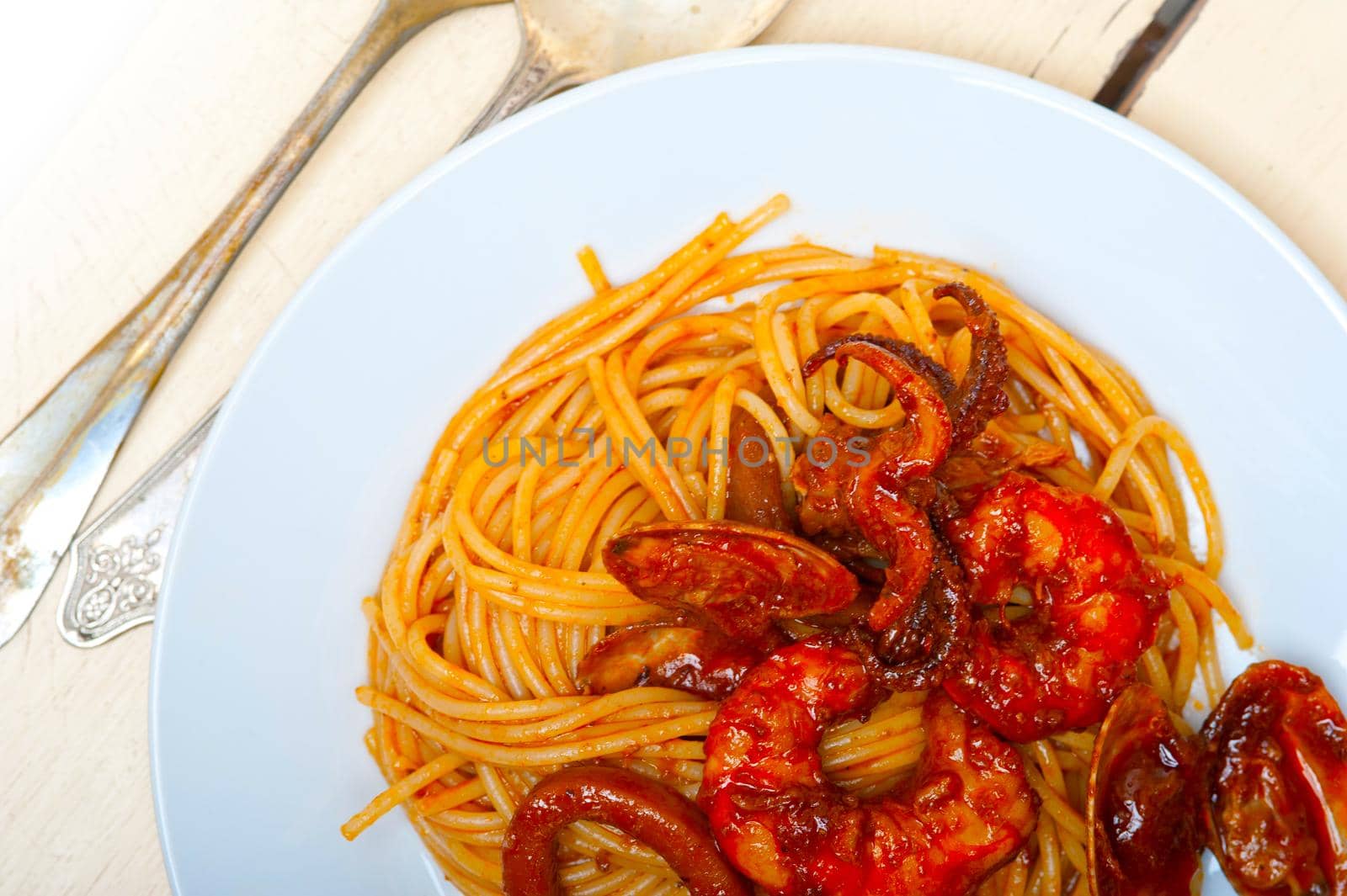 Italian seafood spaghetti pasta on red tomato sauce  by keko64