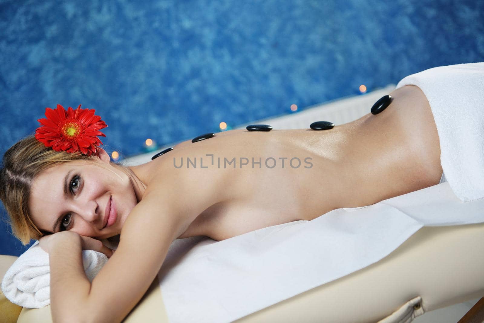 Beautiful young woman in spa by dotshock