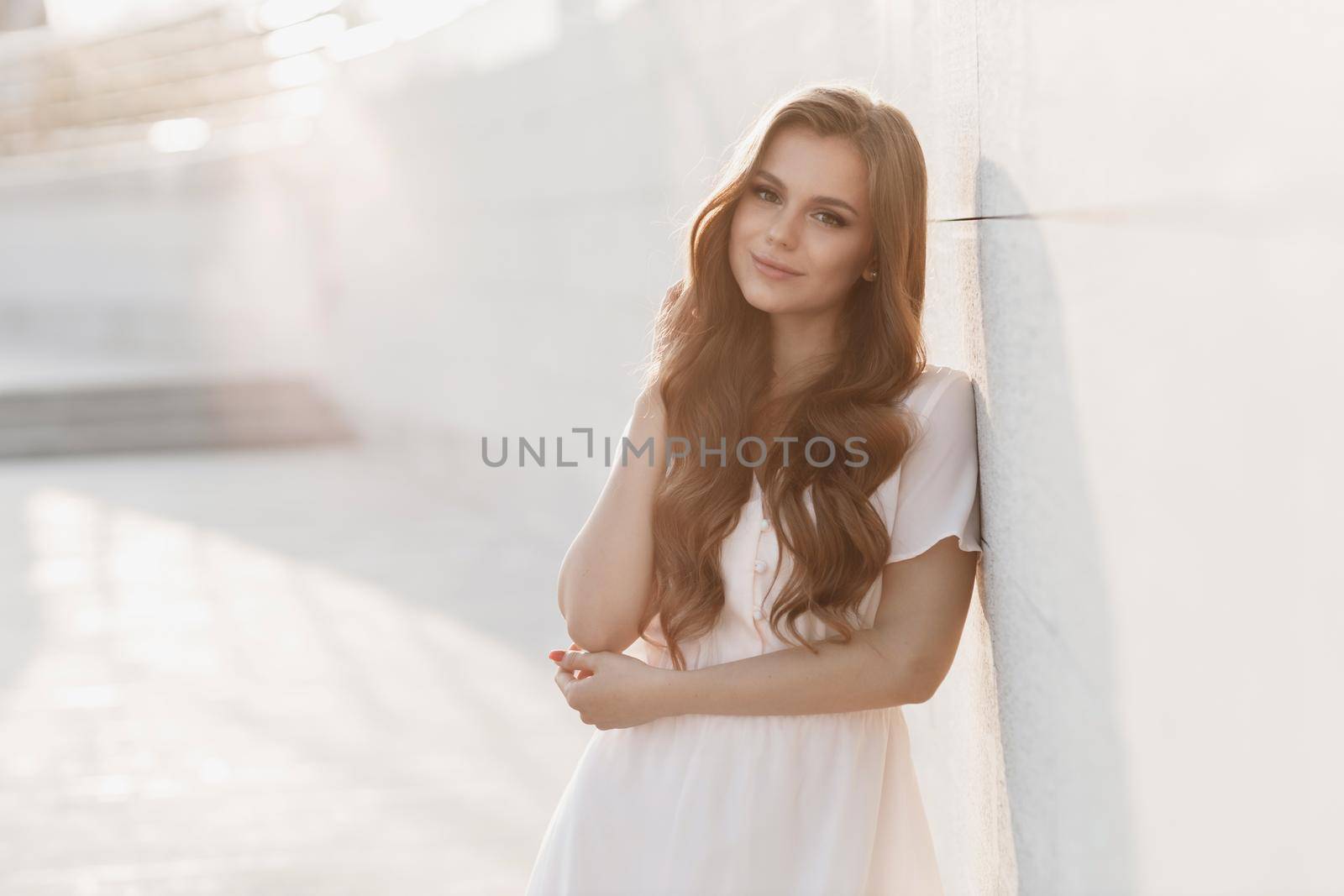 Young happy woman in hat outdoor. High quality photo